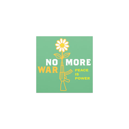 Car magnet featuring yellow daisy growing from rifle illustration with bold “NO MORE WAR” and smaller “PEACE IS POWER” message on green background.