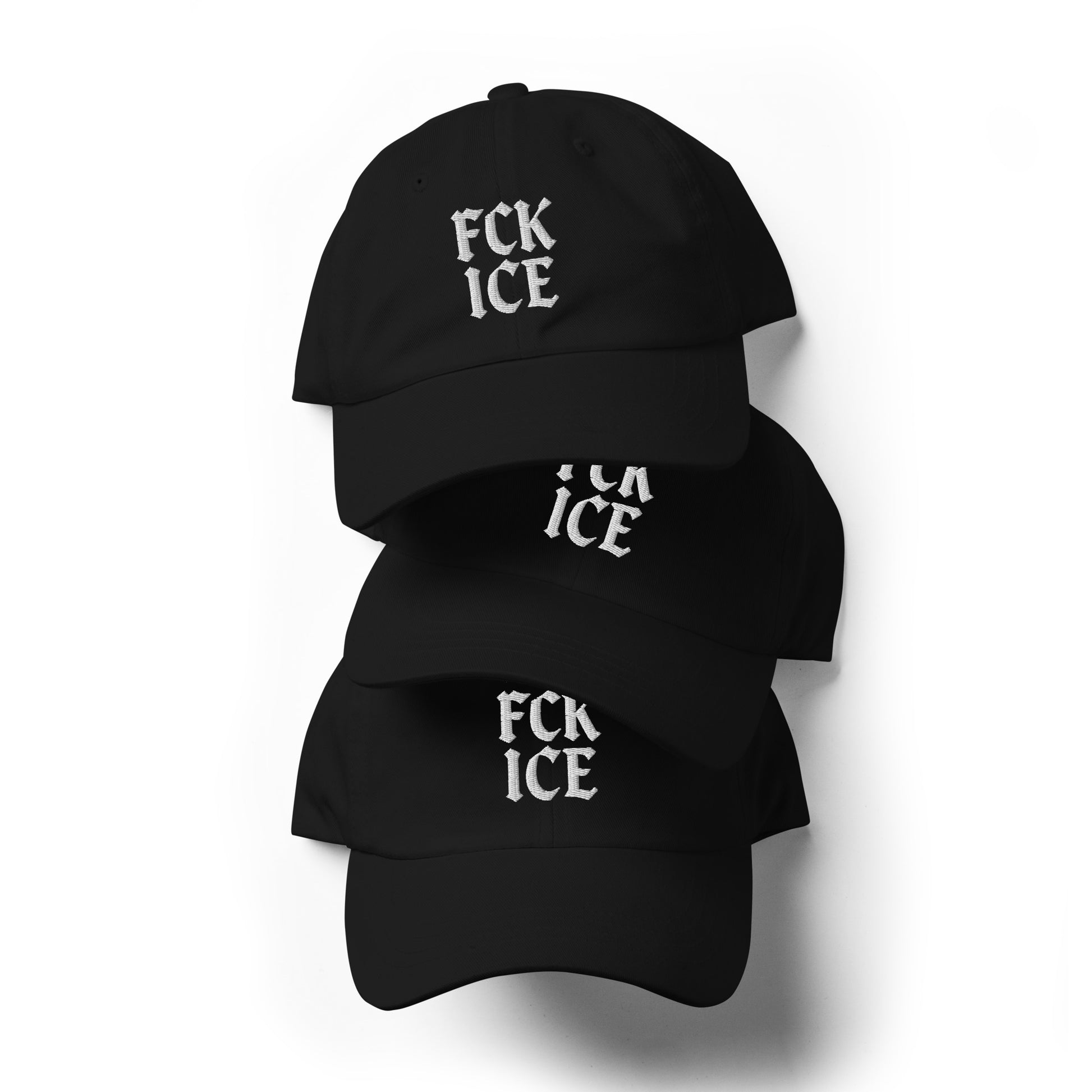 White embroidered protest F*CK ICE gothic text lettering against fabric