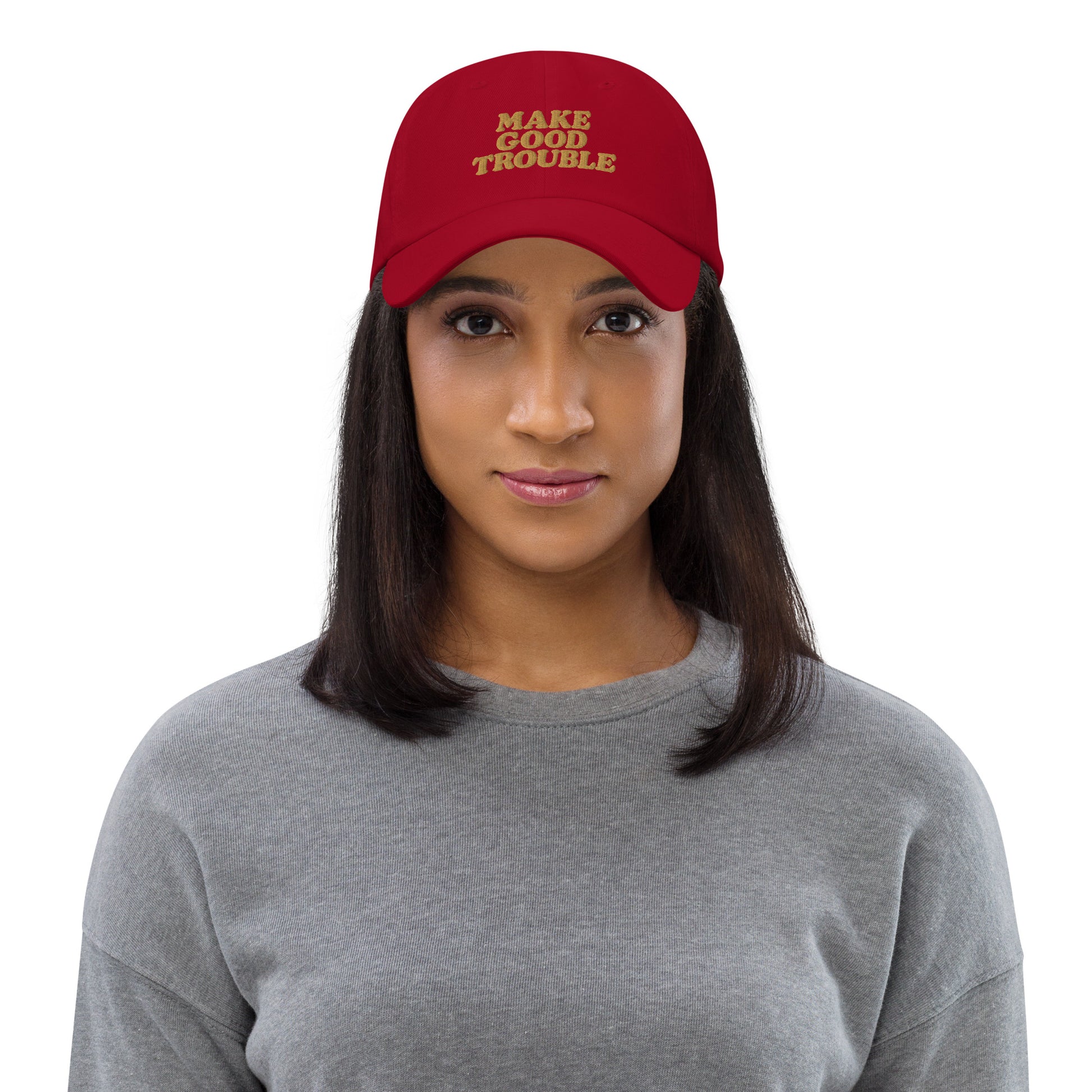 Lifestyle Image: Female protester wearing Make Good Trouble hat