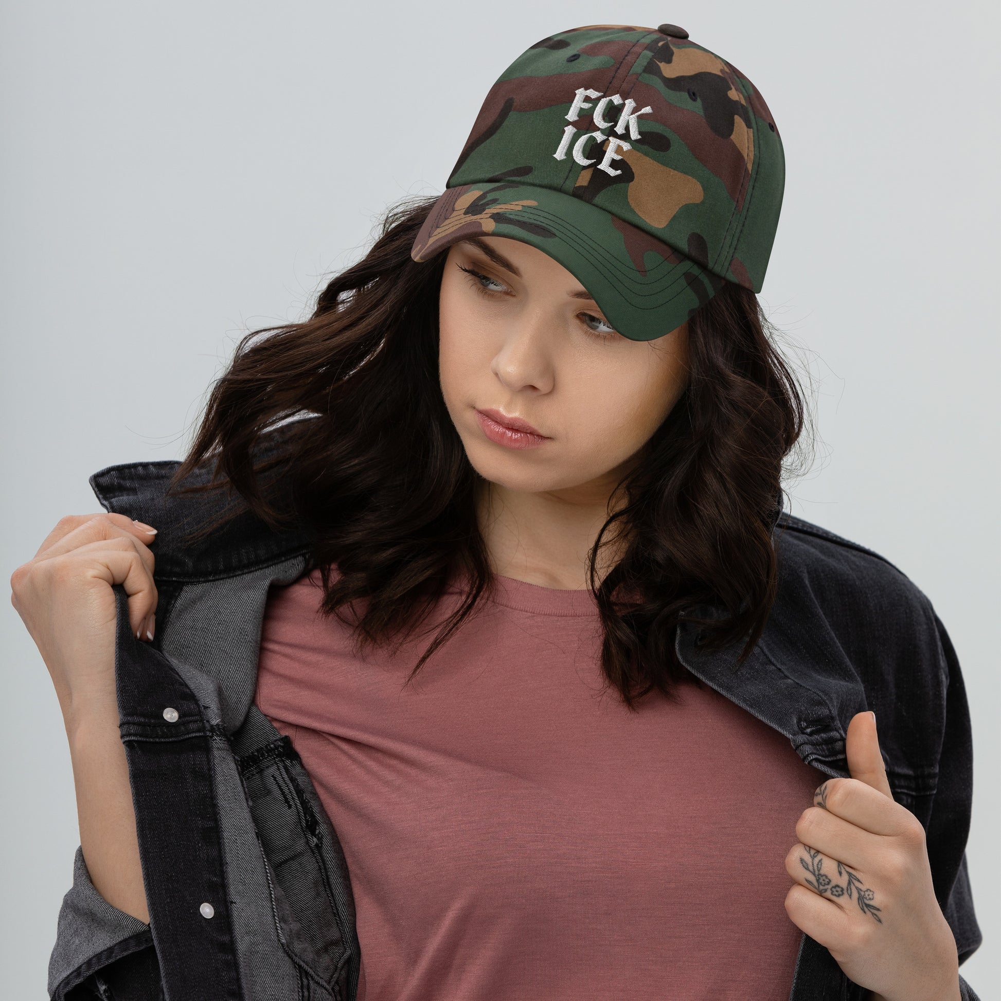 Lifestyle Image: Female Activist Model wearing F*CK ICE gothic text anti-ICE abolitionist hat