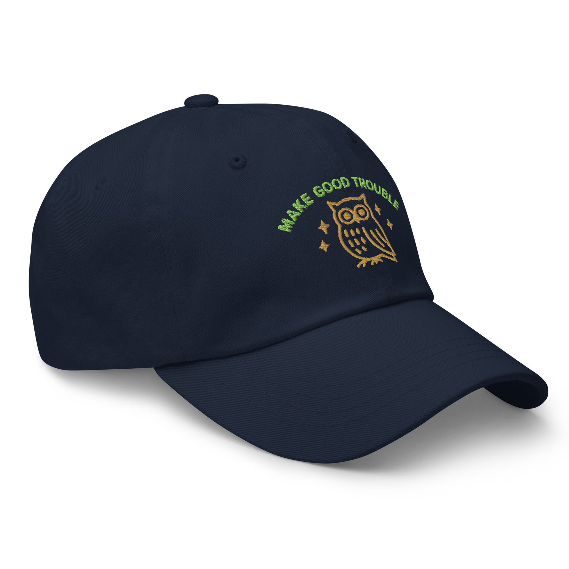 Side Front view of embroidered dad hat with “Make Good Trouble” text and golden owl - Navy Blue