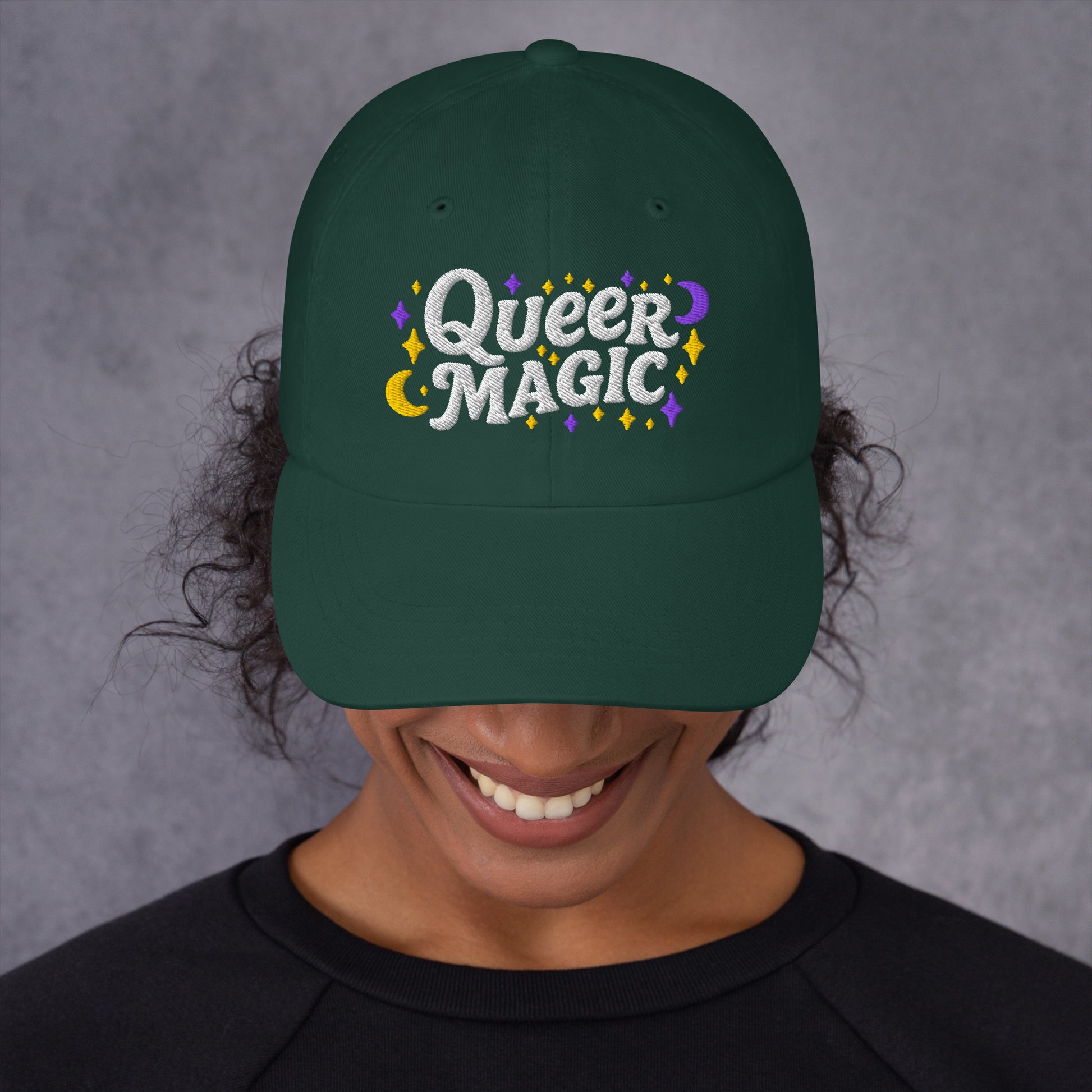 Lifestyle Image: Woman wearing Queer Magic LGBTQ+ Rights Dad Hat at a Pride event