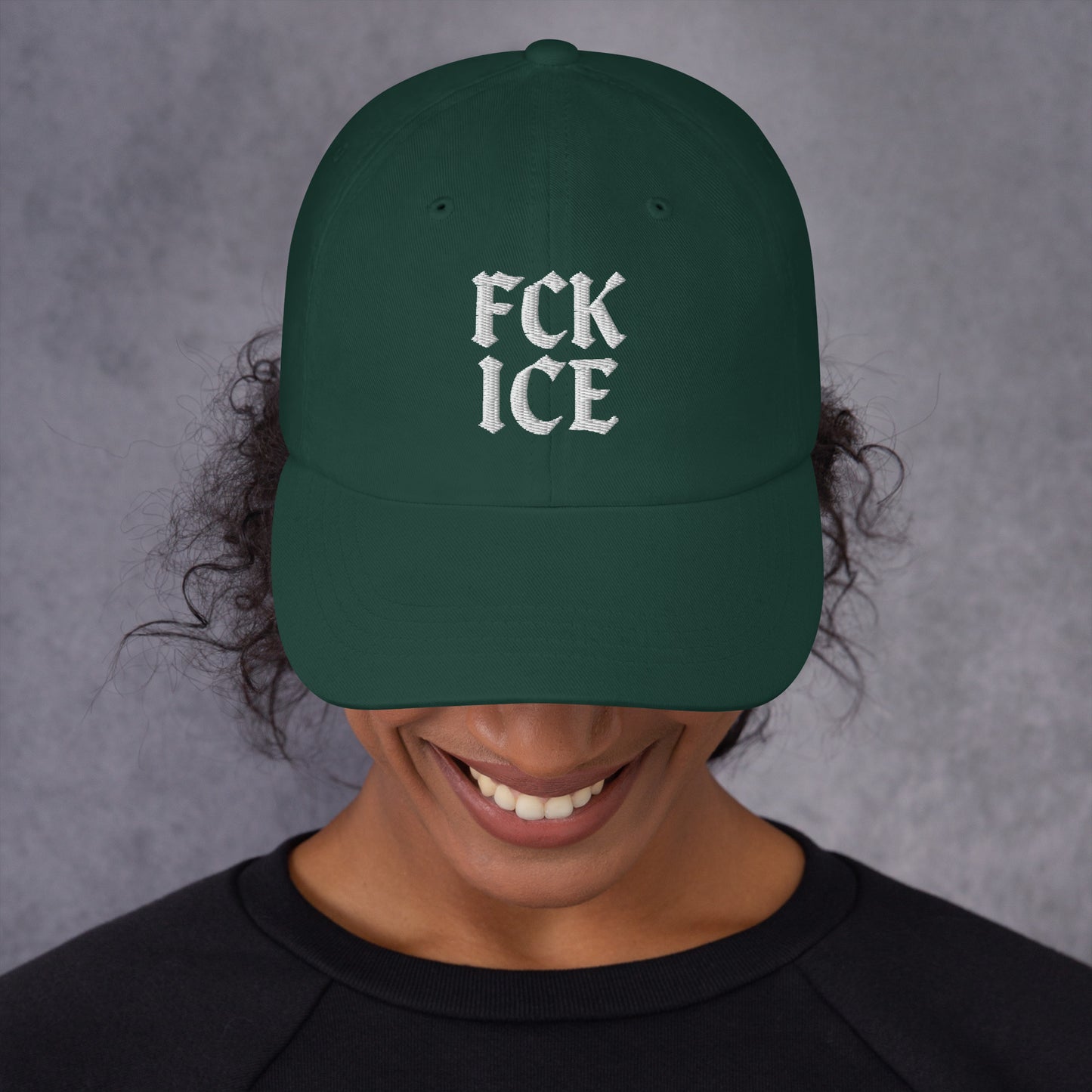 Lifestyle Image: Female Model wearing F*CK ICE gothic text anti-ICE abolitionist hat