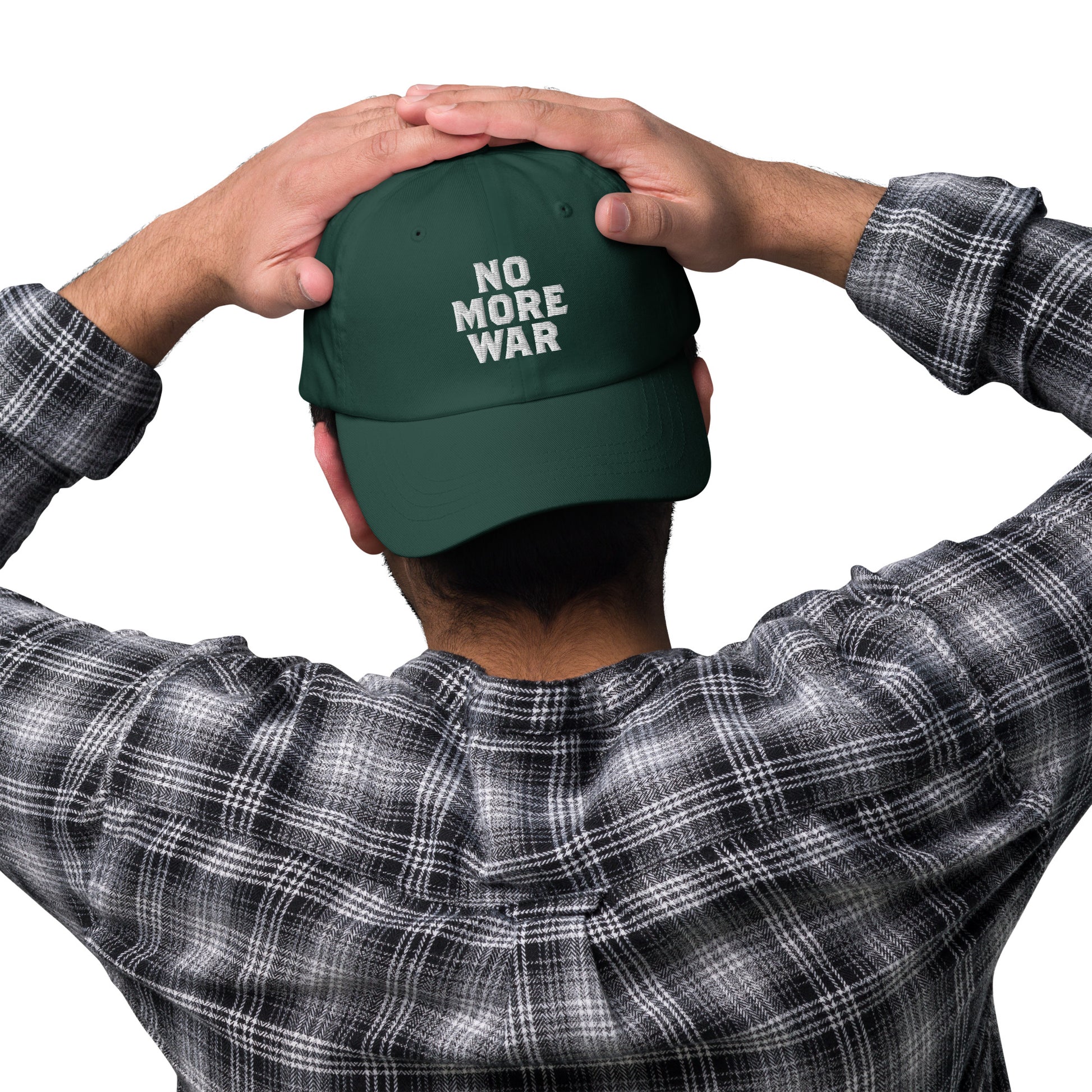 Peace activist wearing the No More War Anti-War Peace Activist Dad Hat