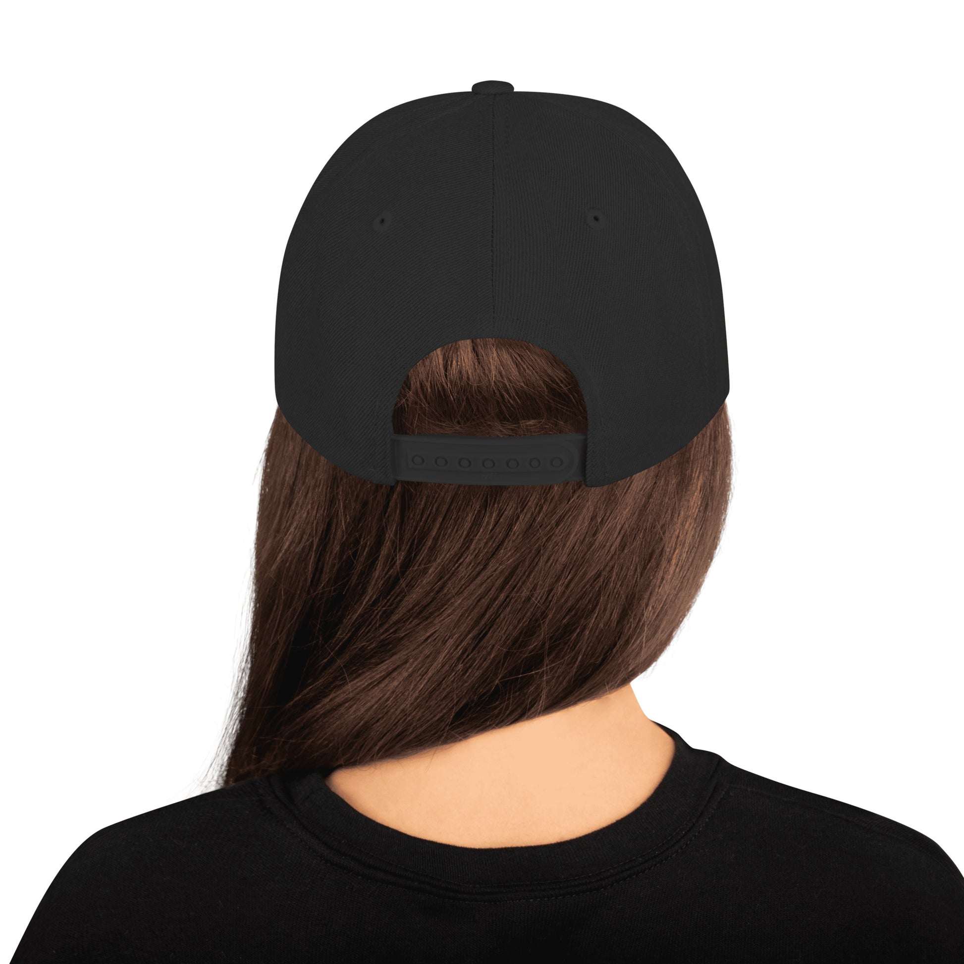 Back view of a black snapback hat showing adjustable plastic closure and structured panels, clean minimalist design with no back embroidery visible.