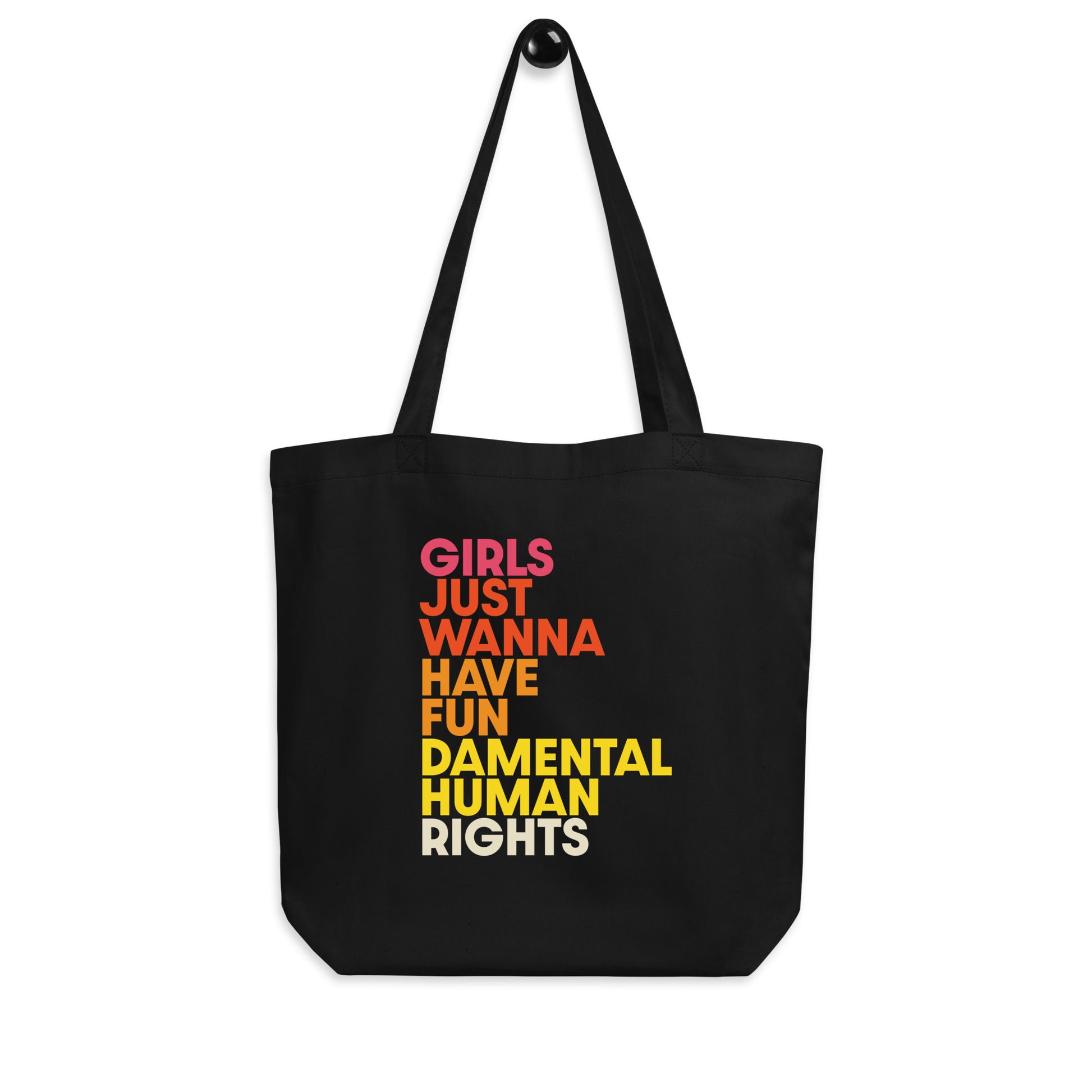 Front view of the black “Girls Just Wanna Have Fundamental Human Rights” tote bag with bright retro typography. Designed by Blue Wave USA.