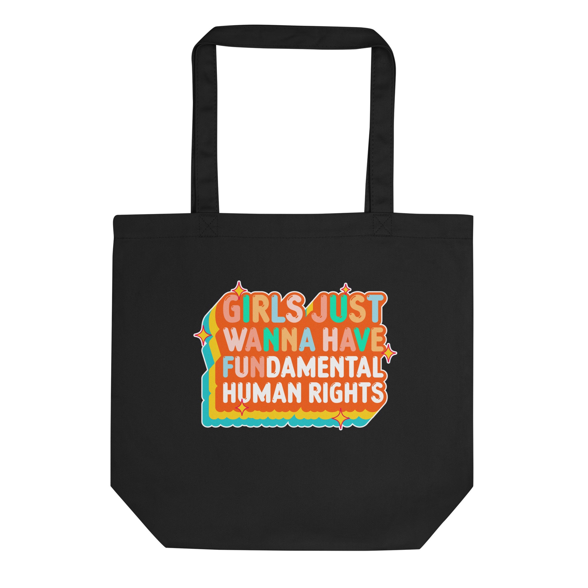 Model holding the black “Girls Just Wanna Have Fundamental Human Rights” eco tote bag over the shoulder. Everyday activist accessory by Blue Wave USA.