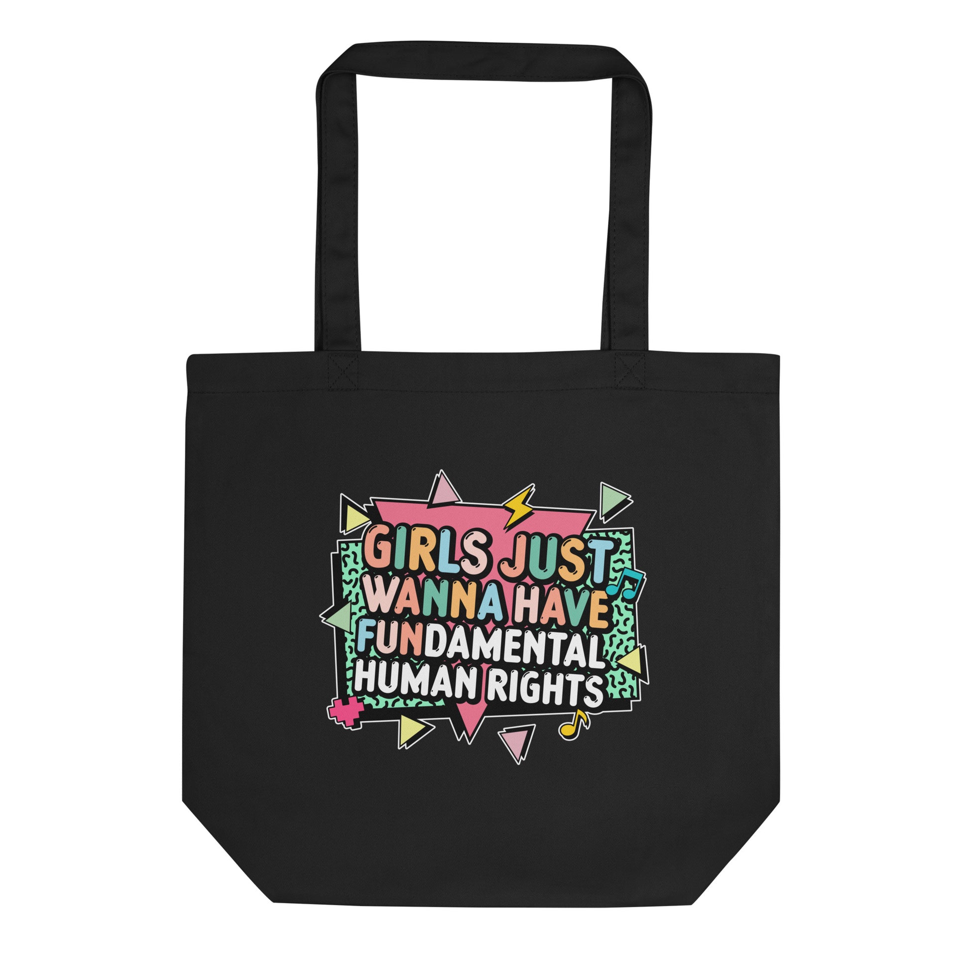 Black eco tote bag featuring the colorful retro slogan “Girls Just Wanna Have Fundamental Human Rights” with geometric accents in pink, mint, and yellow. Bold feminist statement tote celebrating equality.