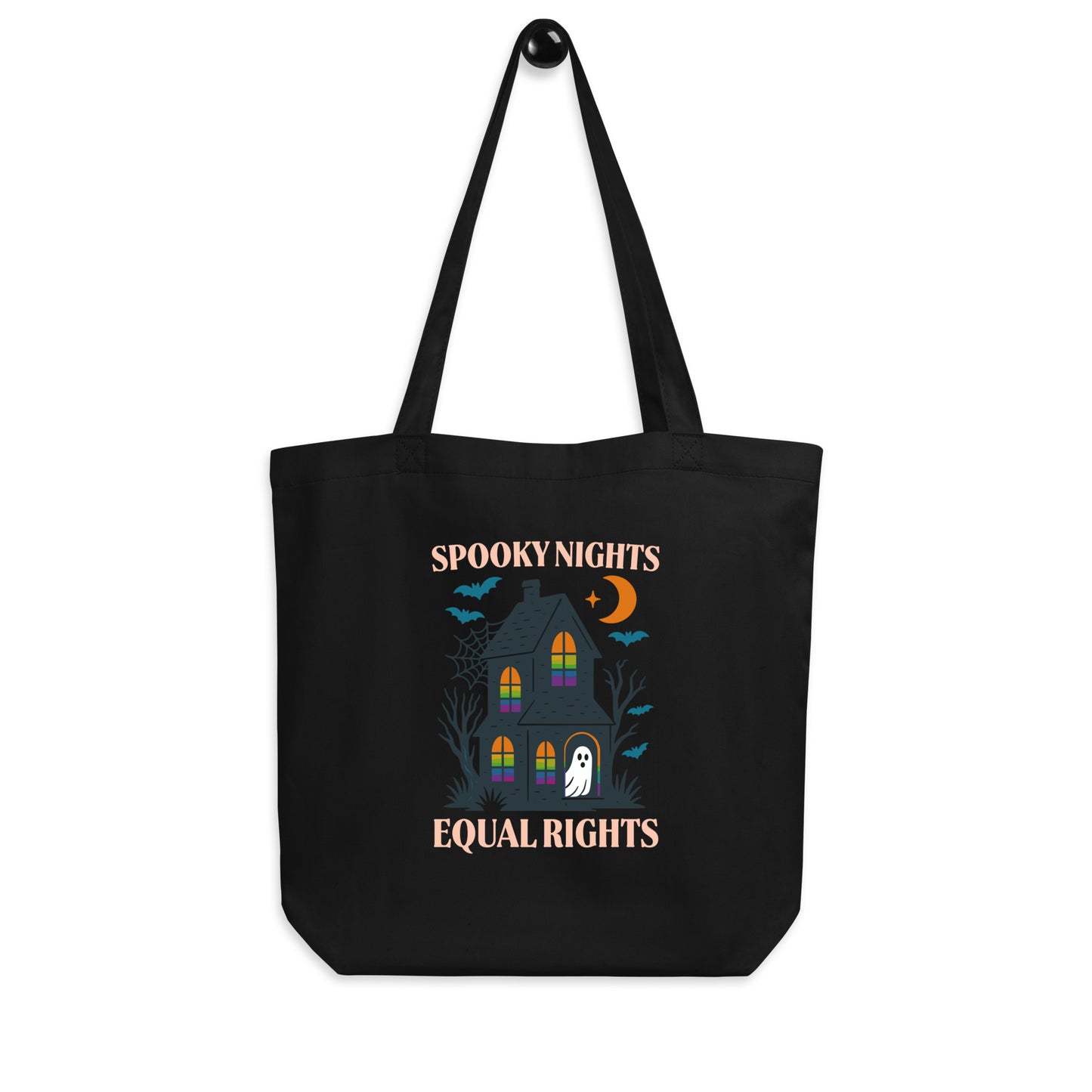 Black “Spooky Nights Equal Rights” tote bag with illustrated haunted house and ghost design. Playful feminist Halloween bag by Blue Wave USA.