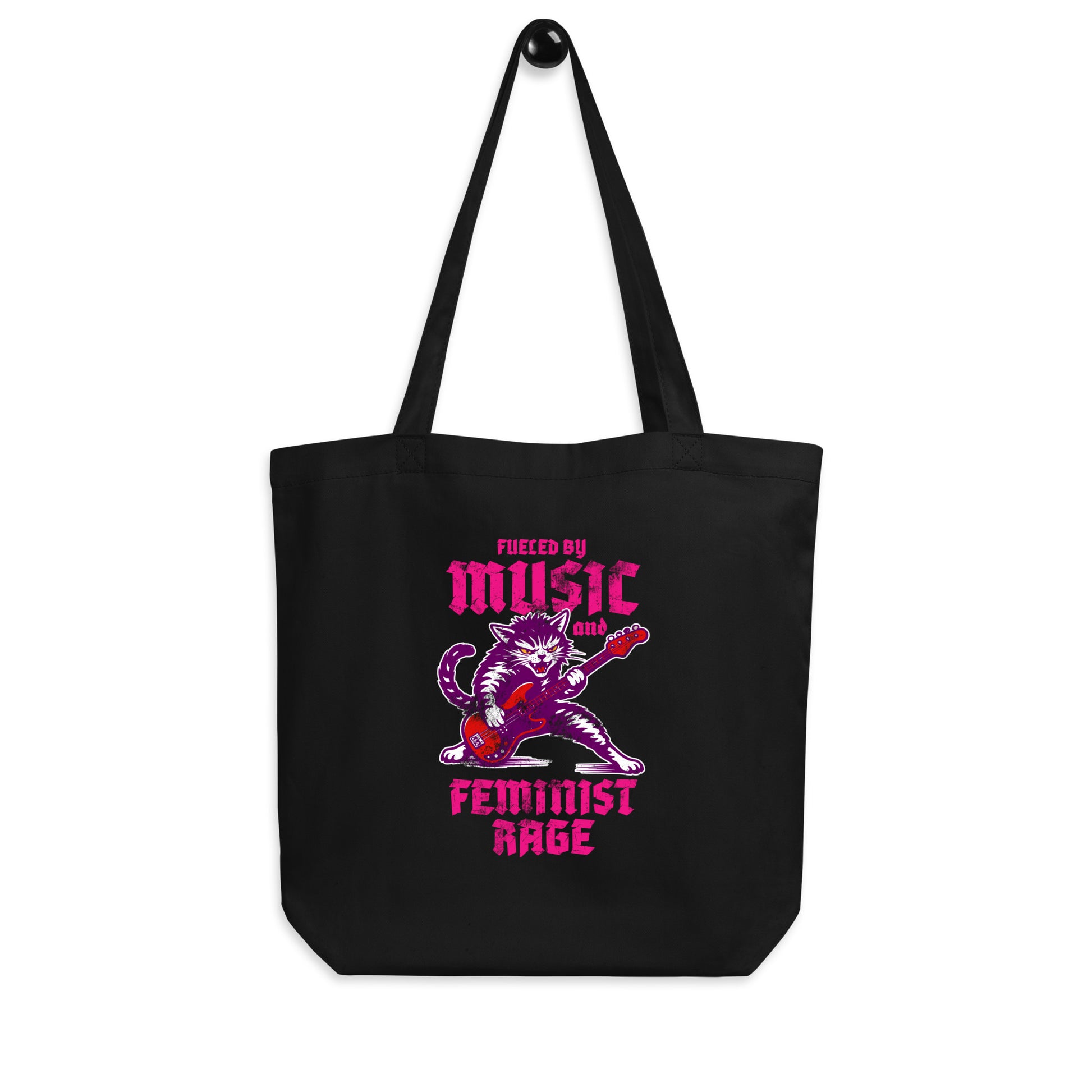 Black eco tote bag displayed on a white background, showing the punk rock cat guitar illustration and gothic text reading “FUELED BY MUSIC AND FEMINIST RAGE,” from Blue Wave USA.