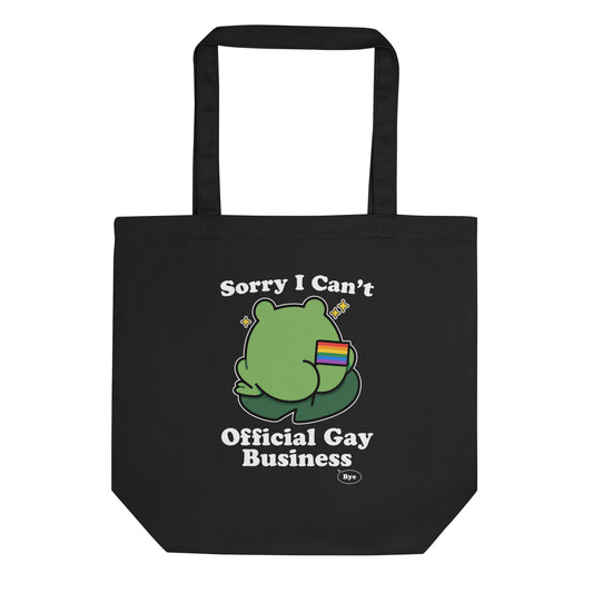 Black eco tote bag featuring a frog holding a rainbow flag with “Sorry I Can’t. Official Gay Business. Bye.” text and playful LGBTQ+ pride-inspired artwork.