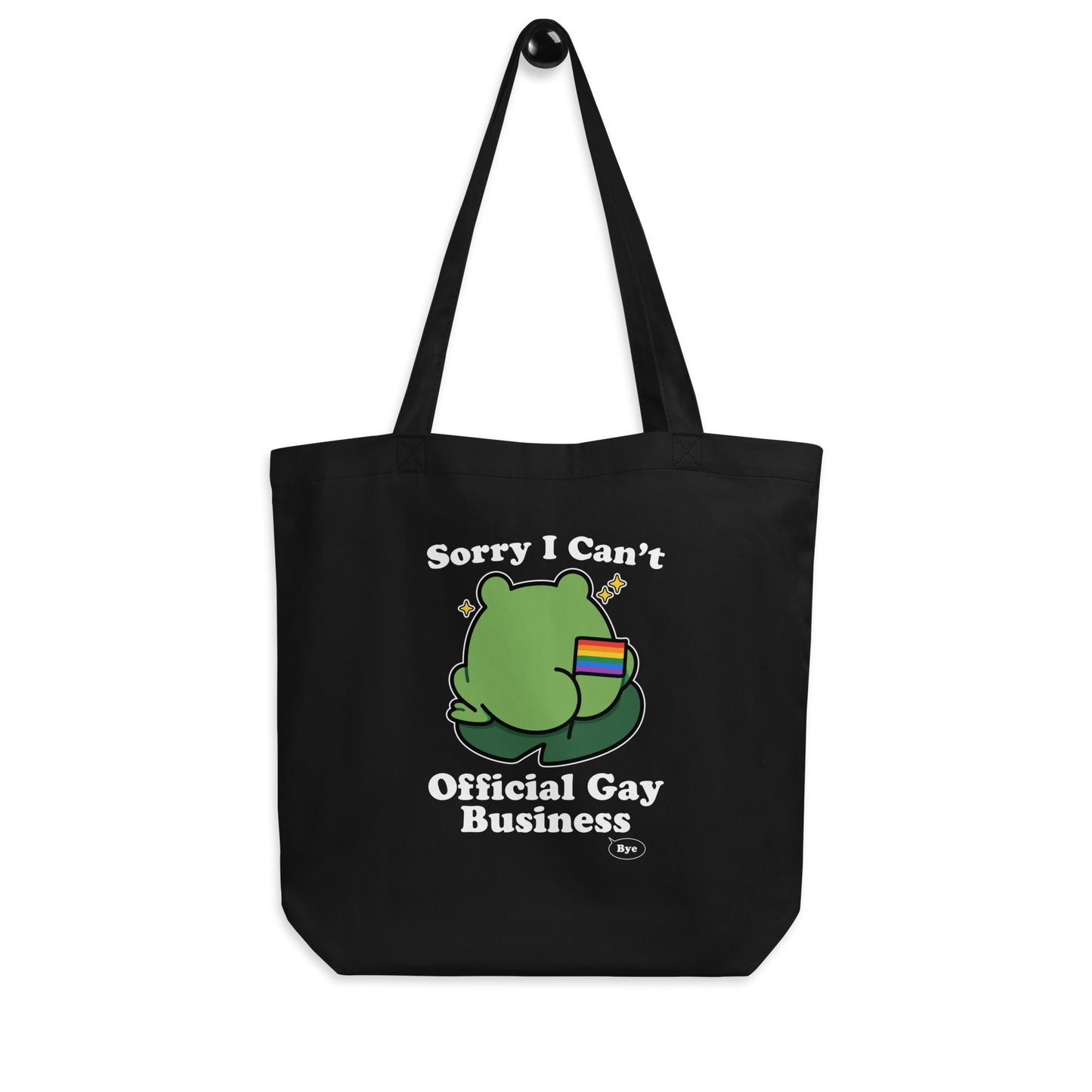 Black reusable tote bag displaying a cartoon frog with rainbow flag detail and humorous “Official Gay Business” message celebrating queer joy and self-expression.