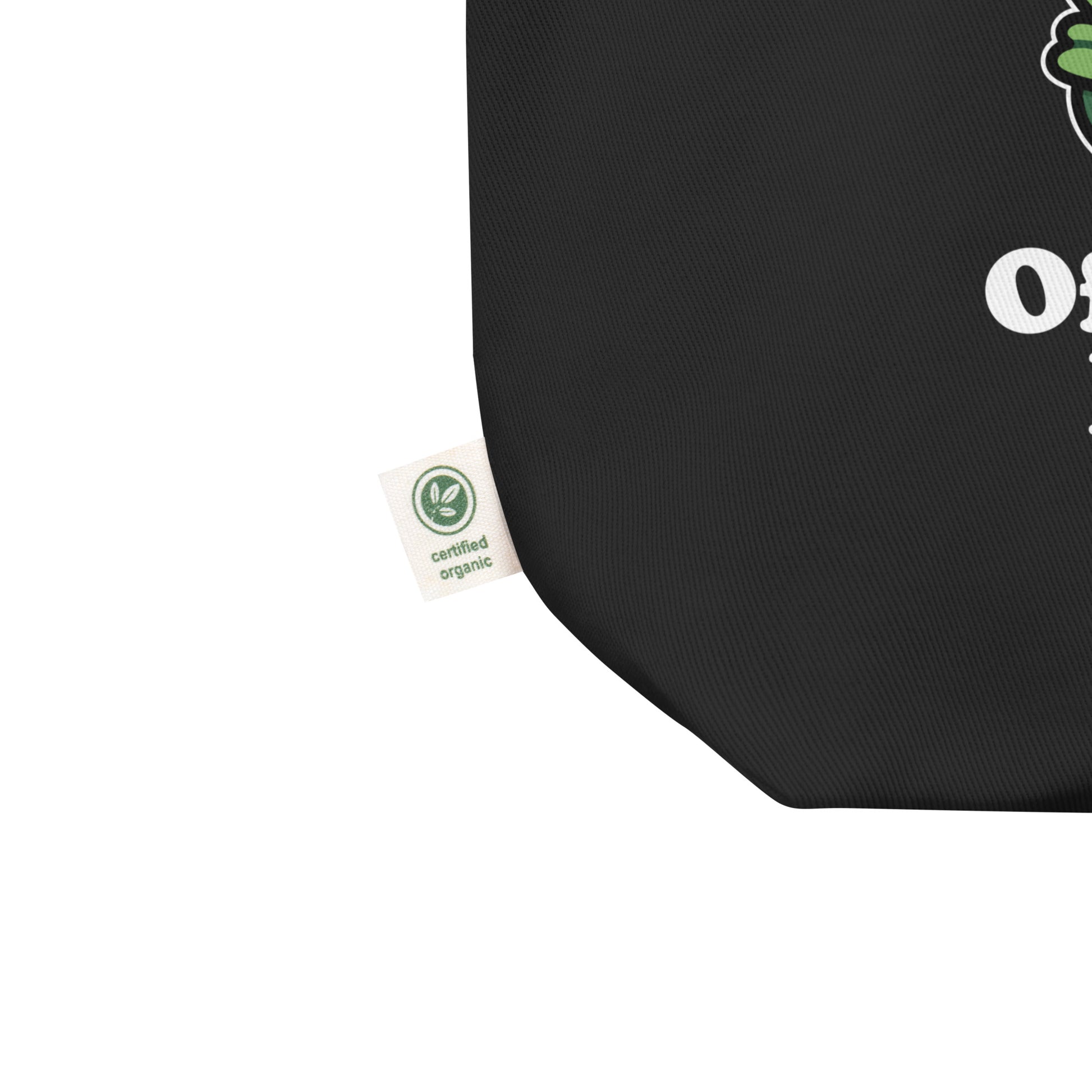 Close-up of black eco tote bag showing durable cotton construction and frog artwork with rainbow flag accents inspired by LGBTQ+ pride culture.