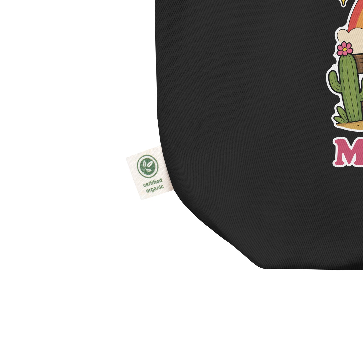 Close-up detail of black eco tote bag featuring vibrant rainbow cowboy frog artwork and “Y’All Means All” LGBTQ+ pride design.