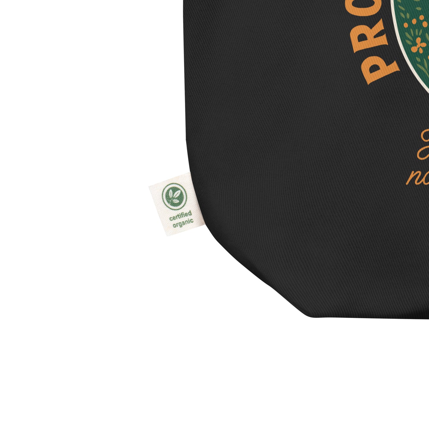Close-up detail of eco tote bag featuring a scenic public lands illustration with mountains, river, trees, wildlife, and conservation-focused typography.