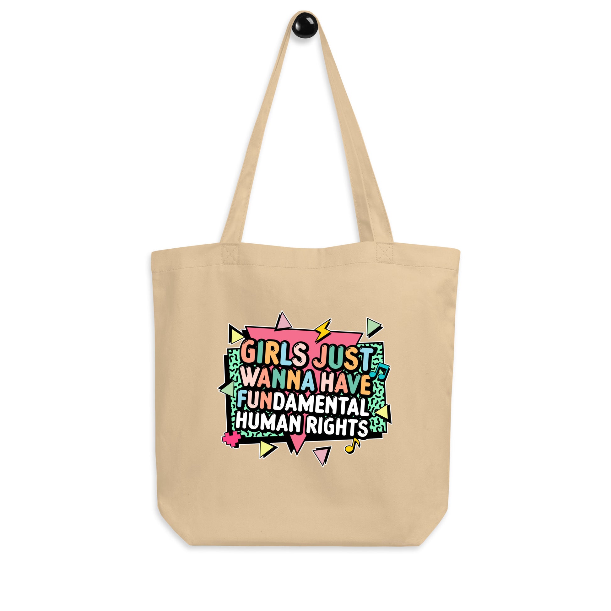 Hanging natural tote featuring the retro pastel feminist message “Girls Just Wanna Have Fundamental Human Rights.” Playful and bold design for social justice advocates.