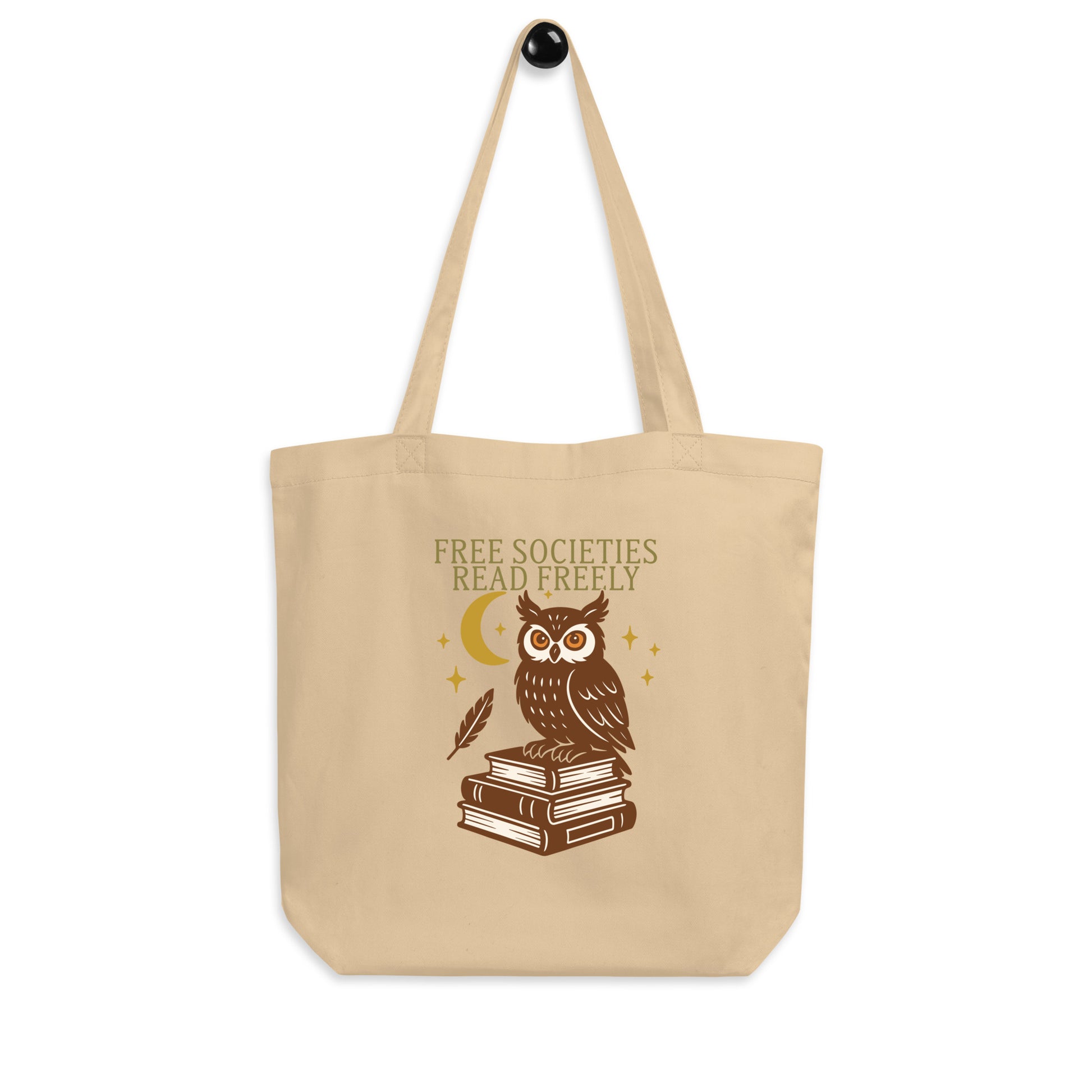Natural color canvas “Free Societies Read Freely” tote bag with illustrated owl and moon graphic. Book-lover and literacy-rights eco bag by Blue Wave USA.