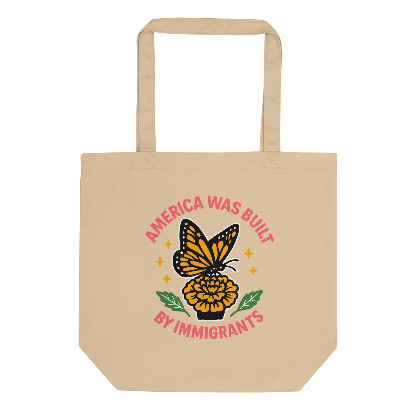 Natural eco tote bag with bold butterfly and marigold design reading “America Was Built by Immigrants.” Immigration justice tote by Blue Wave USA.