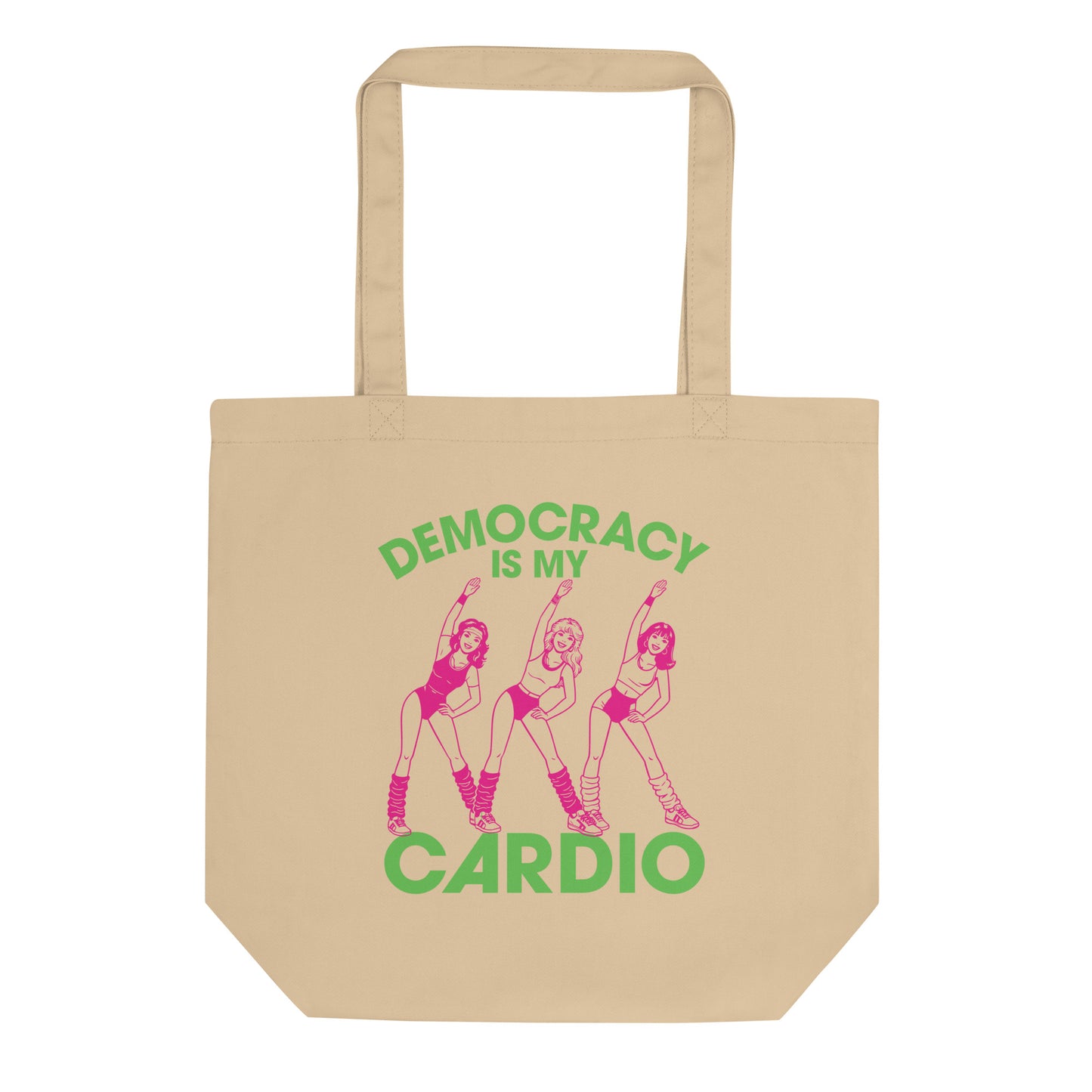 Eco tote bag featuring retro pink aerobics dancers with green “Democracy Is My Cardio” text, vintage fitness-inspired political humor artwork for progressive everyday accessories.