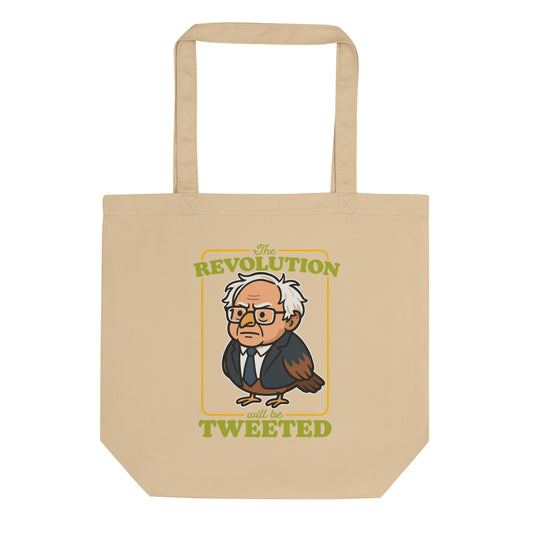 Eco tote bag featuring cartoon Birdie Sanders portrait with “The Revolution Will Be Tweeted” text, playful political humor design for progressive everyday accessories.