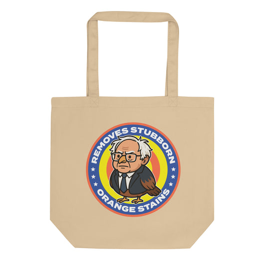 Eco tote bag featuring Birdie Sanders parody detergent badge with “Removes Stubborn Orange Stains” text, playful political humor accessory for progressive everyday use.