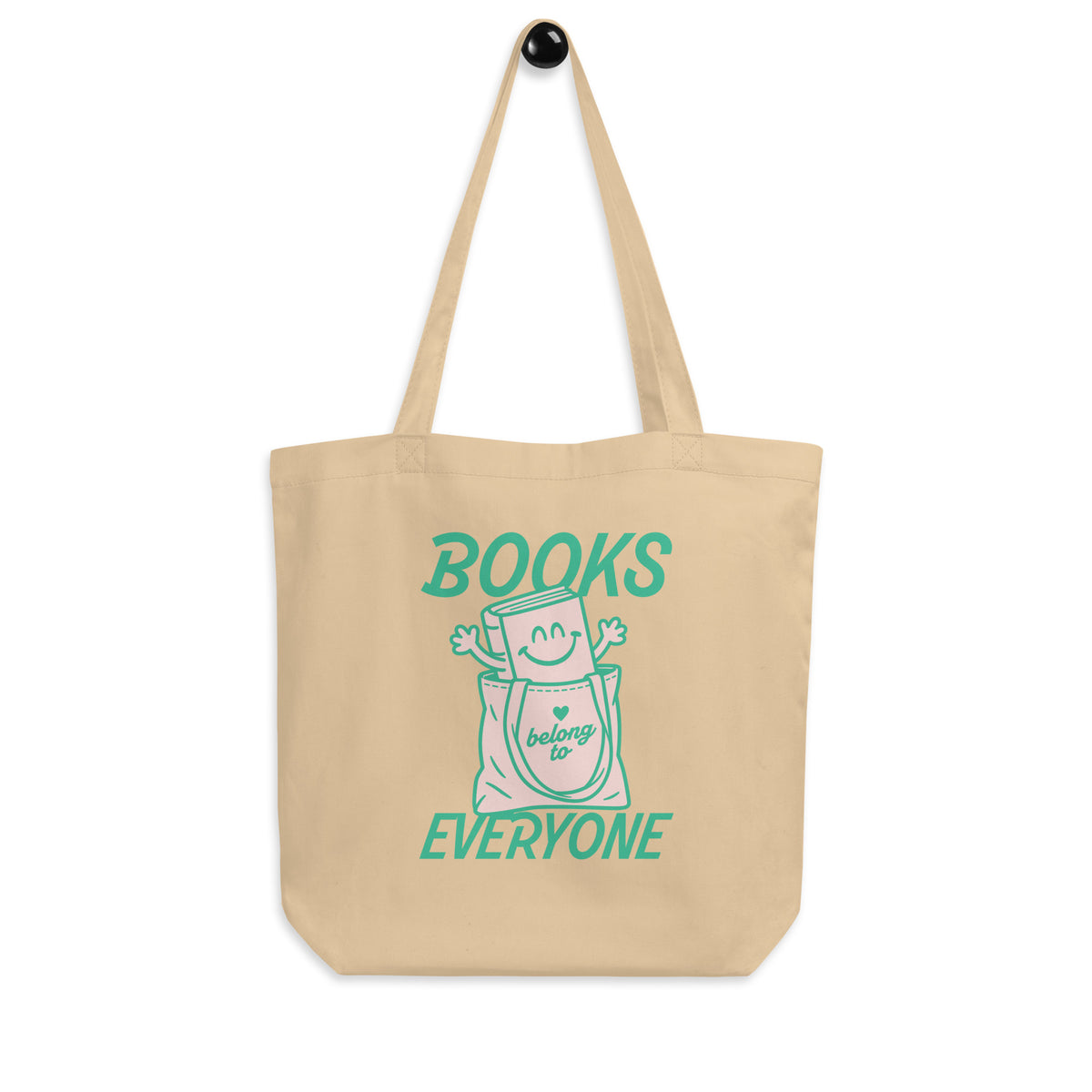 Natural eco tote bag featuring the playful “Books Belong to Everyone” book character graphic in teal.