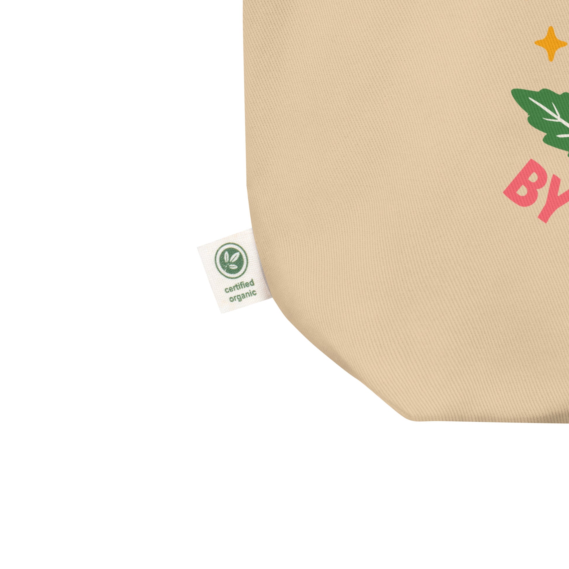 Close-up of the eco-friendly tag on the “America Was Built by Immigrants” tote bag, showing sustainable Blue Wave USA materials.