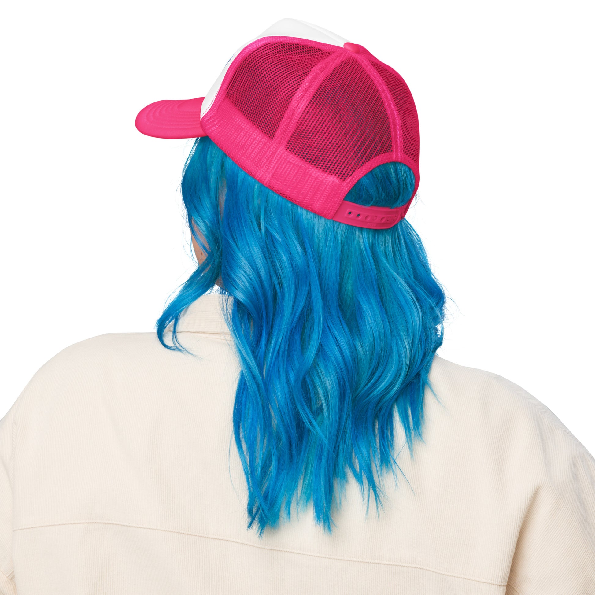 Rear view of trucker hat with pink mesh back and adjustable snap closure, styled with vibrant blue hair model for fit reference.