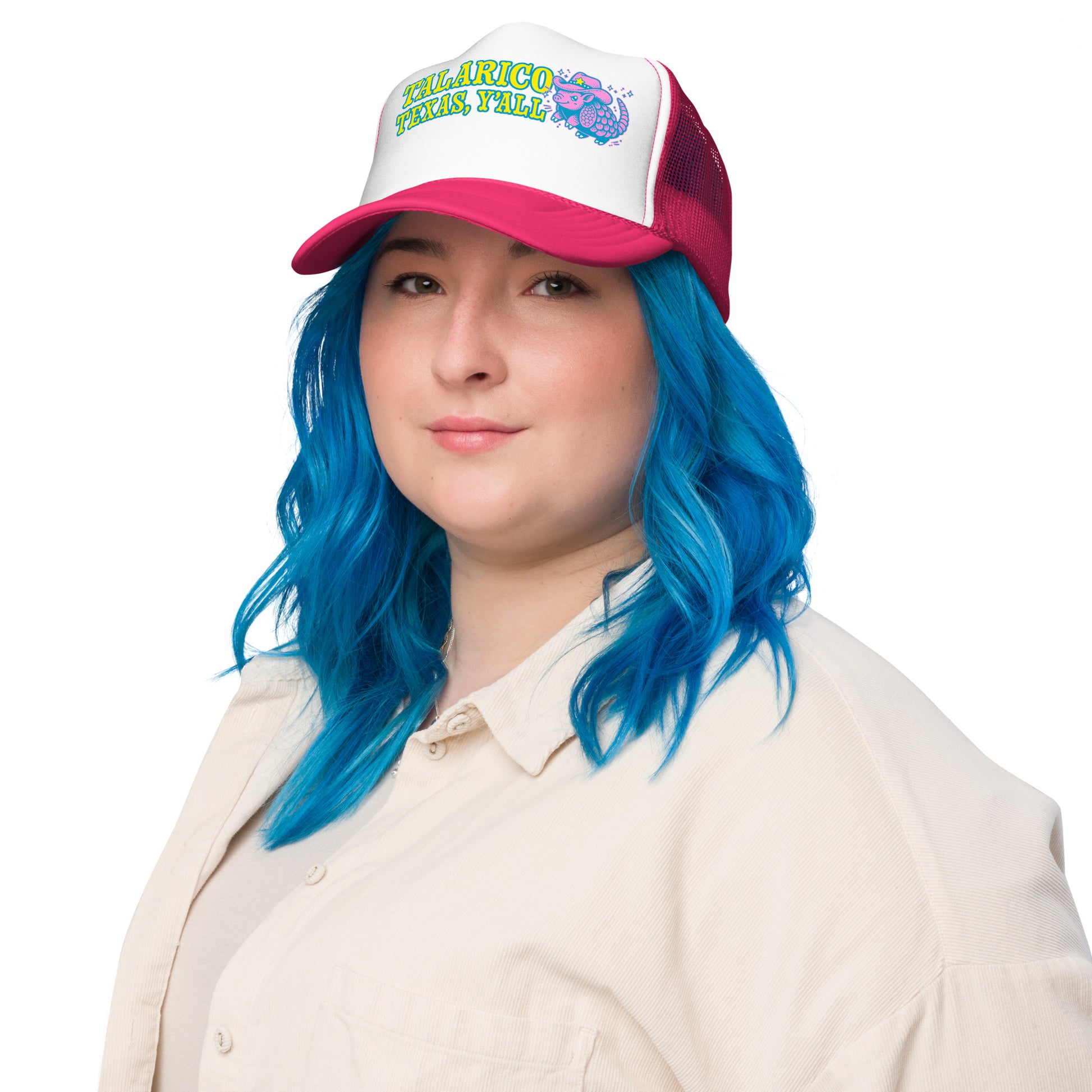 Model wearing foam trucker hat with bright “Talarico Texas Y’all” armadillo design, showing casual fit and front panel artwork.