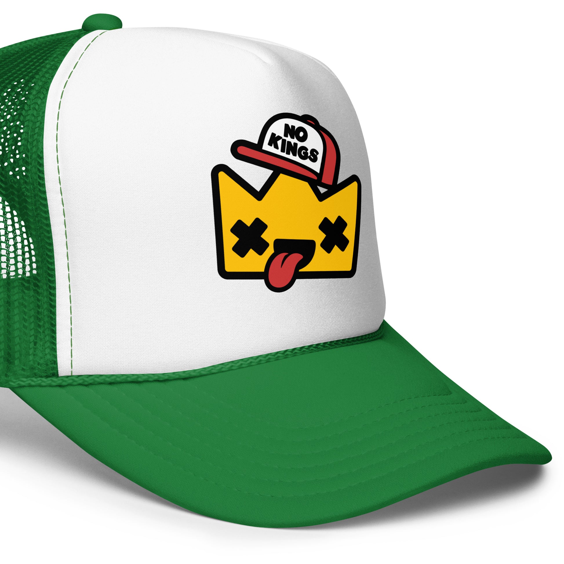 Green and white trucker hat displaying a goofy cartoon crown with X-shaped eyes, tongue out, and a “No Kings” cap, inspired by anti-monarchy and democratic values.