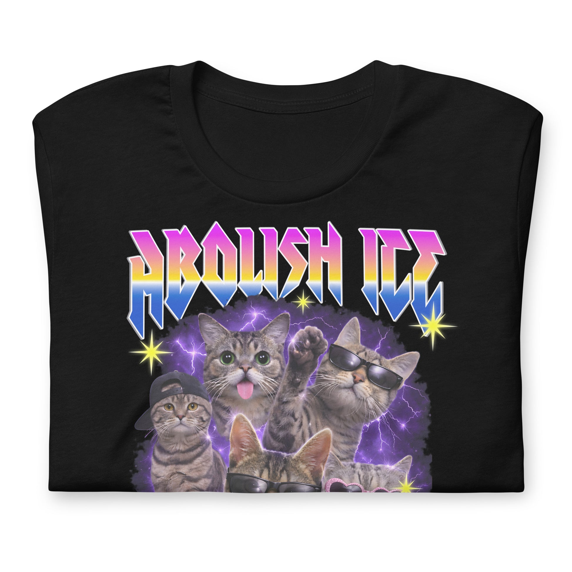 Flat lay of a black unisex t-shirt featuring bootleg cat illustration with lightning and stars, rainbow “ABOLISH ICE” text, and “Get The Fuck Out,” design by Blue Wave USA.