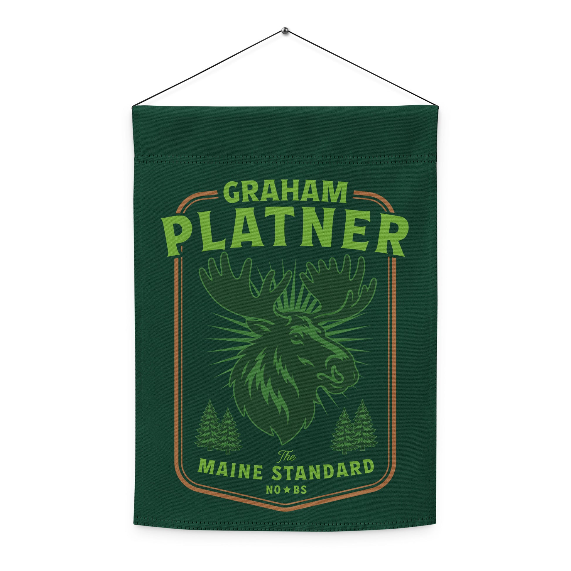 Hanging green garden flag with moose artwork and “Graham Platner Maine Standard” text in rustic regional Maine design.