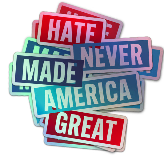 Political protest holographic sticker with “Hate Never Made America Great” in sign-style blocks of red and blue.