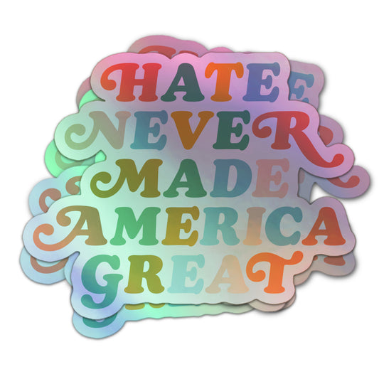Holographic sticker with the message “Hate Never Made America Great” in colorful, swirly retro letters.