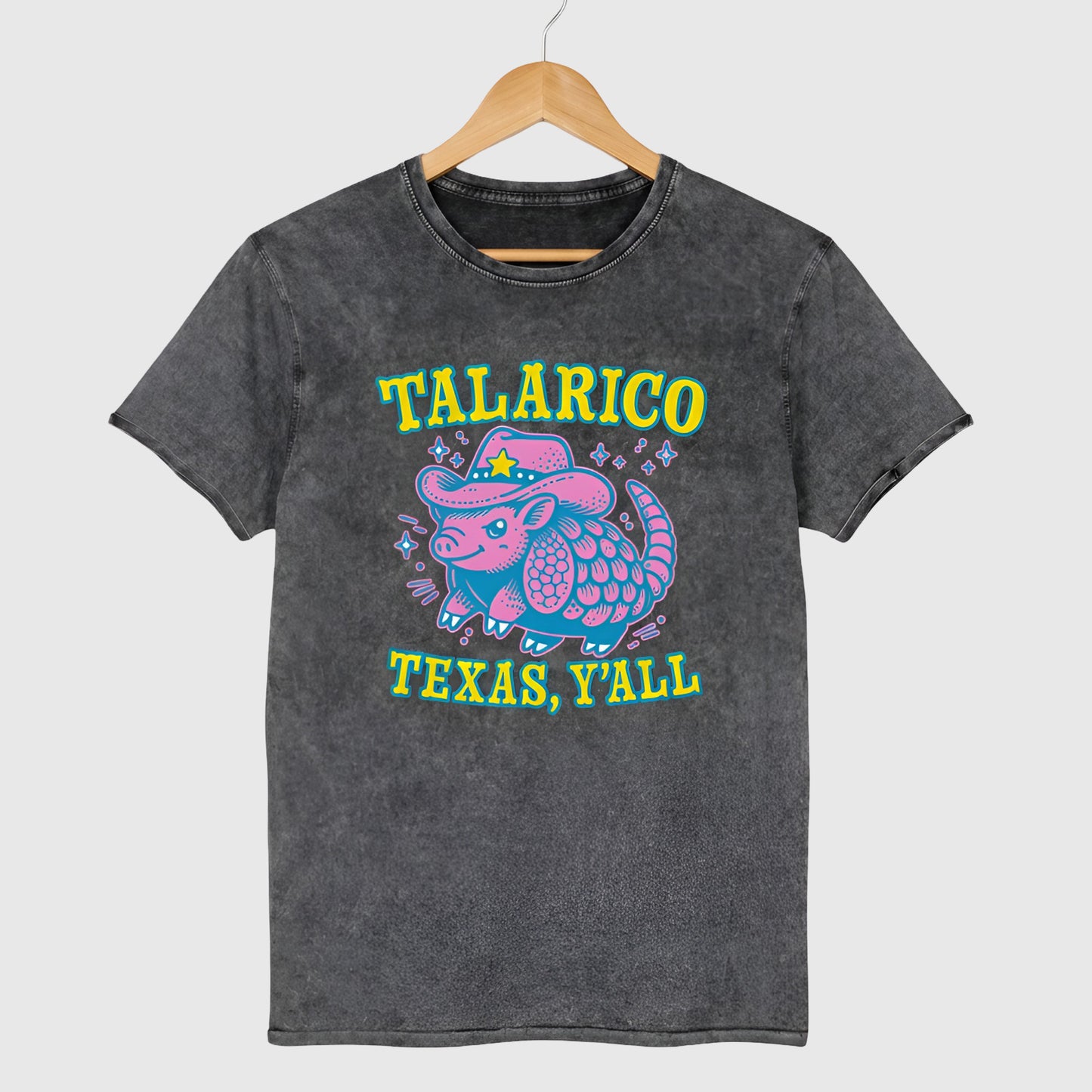 Black denim t-shirt featuring colorful western armadillo in cowboy hat with bold “Talarico Texas, Y’all” text in bright retro Texas graphic style.