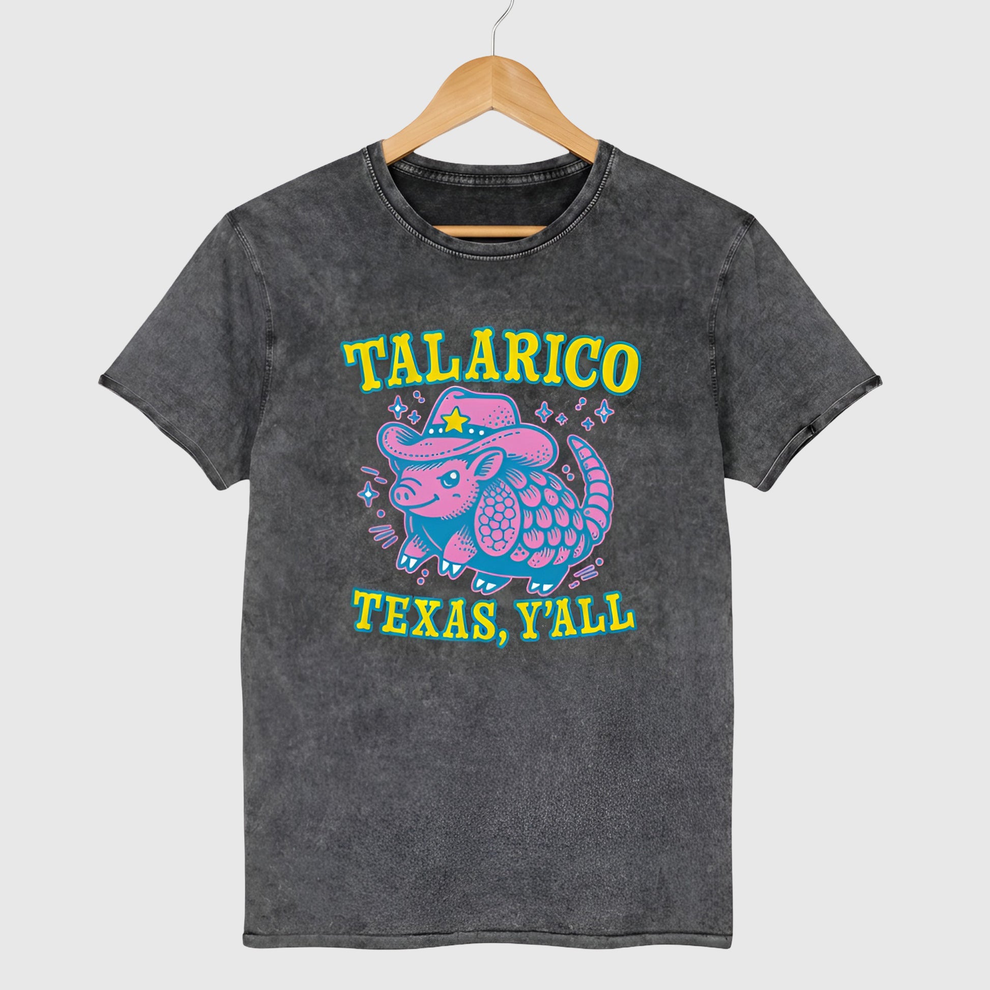 Black denim t-shirt featuring colorful western armadillo in cowboy hat with bold “Talarico Texas, Y’all” text in bright retro Texas graphic style.