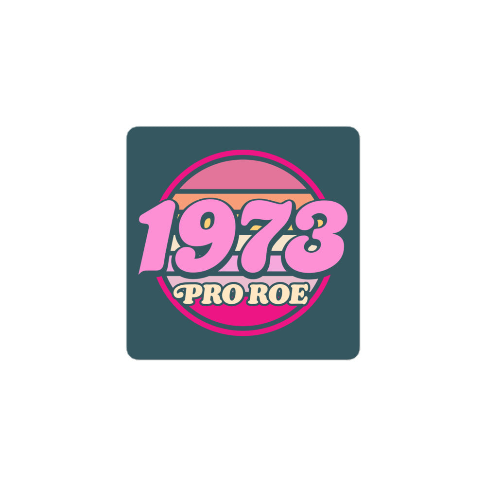 Square vinyl sticker displayed on a white background, featuring a distressed retro circular badge in pink tones with bold text reading “1973 PRO ROE.”