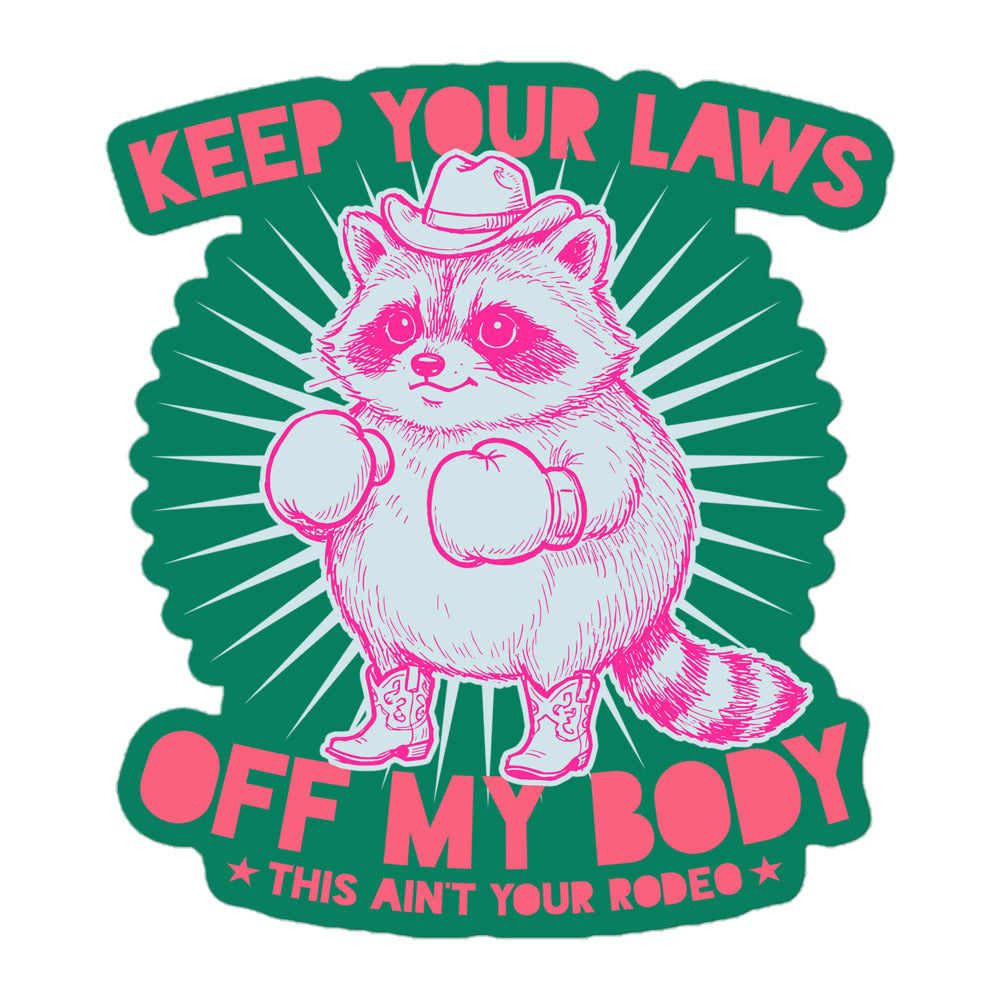 Die-cut sticker featuring pink cowboy raccoon with boxing gloves and “Keep Your Laws Off My Body” text, bold feminist protest design for reproductive rights.