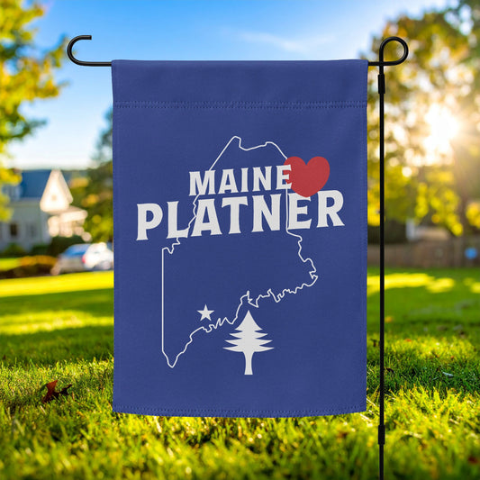 Garden flag featuring the “Maine Loves Platner” design with a Maine state outline, heart icon, and pine tree graphic supporting Graham Platner for Maine.