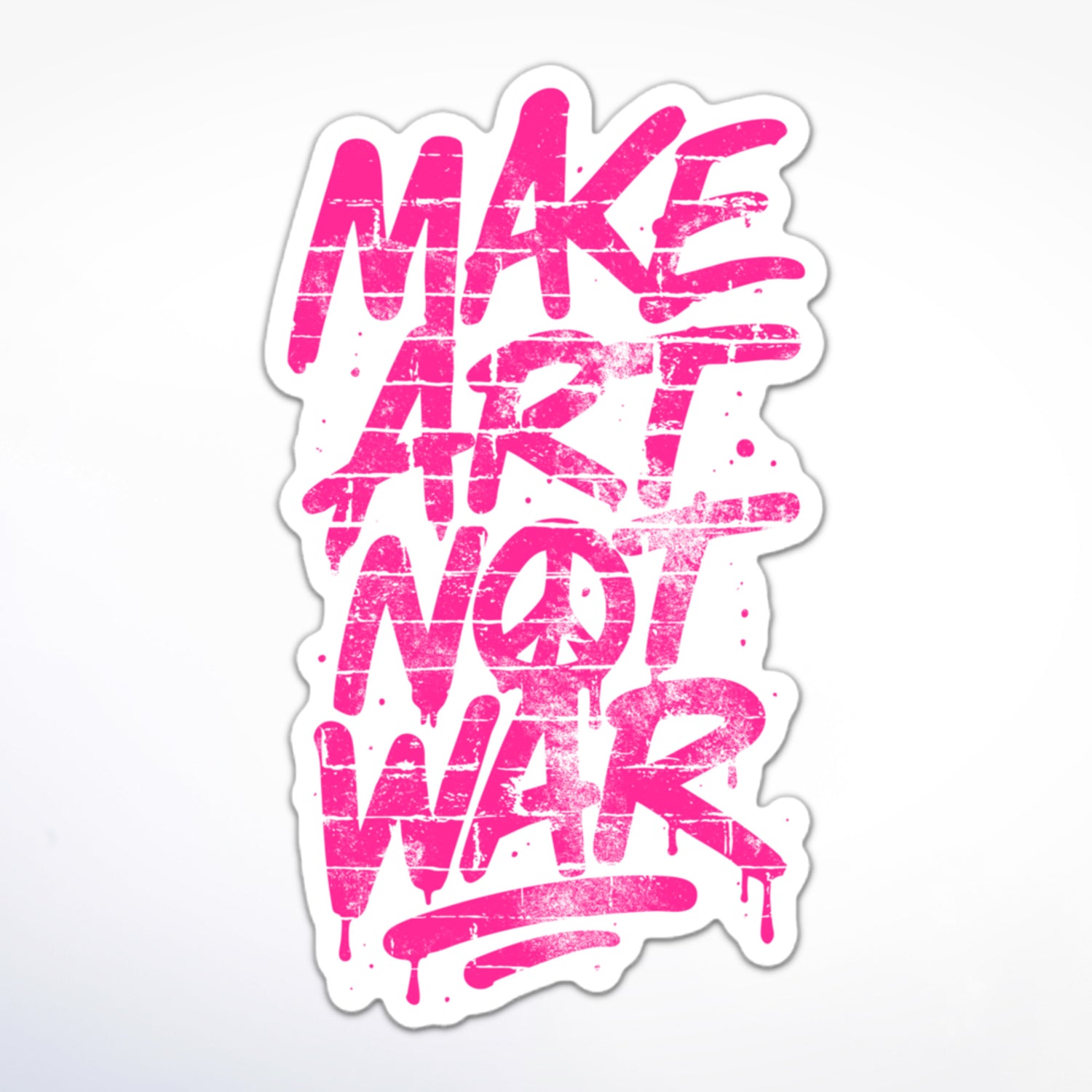 Die-cut sticker with bright pink graffiti-style lettering reading “MAKE ART NOT WAR,” featuring a distressed spray-paint texture on a white background.