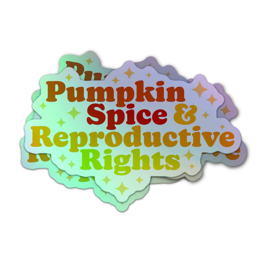 Pro-choice holographic sticker with pumpkin spice theme, bright lettering, and gold sparkles.