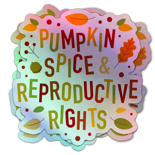 Holographic sticker with the phrase “Pumpkin Spice & Reproductive Rights” in bold fall colors, decorated with autumn leaves and berries.