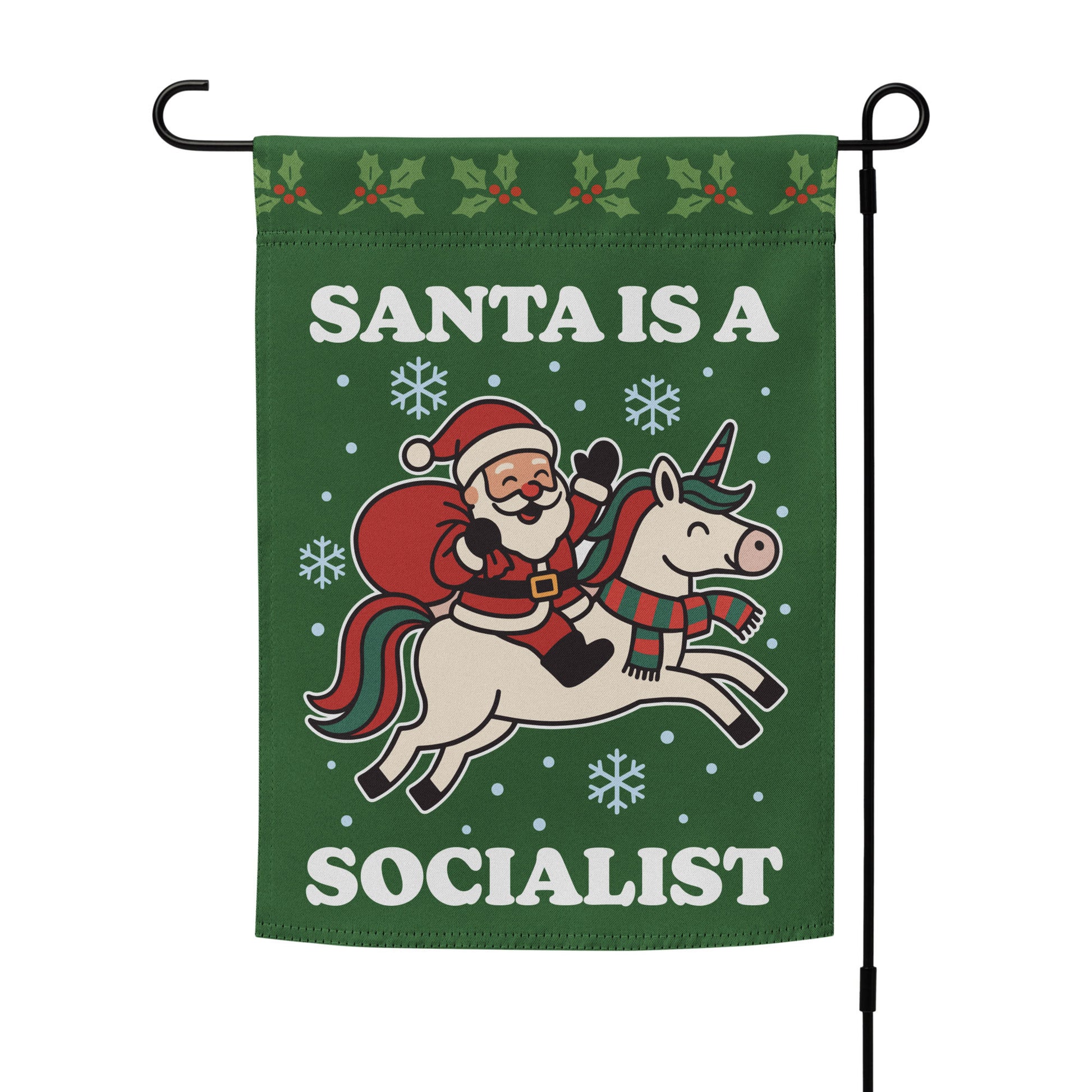 Green garden flag on a metal stand showing a retro Santa riding a unicorn with snowflakes and the printed phrase “SANTA IS A SOCIALIST.”