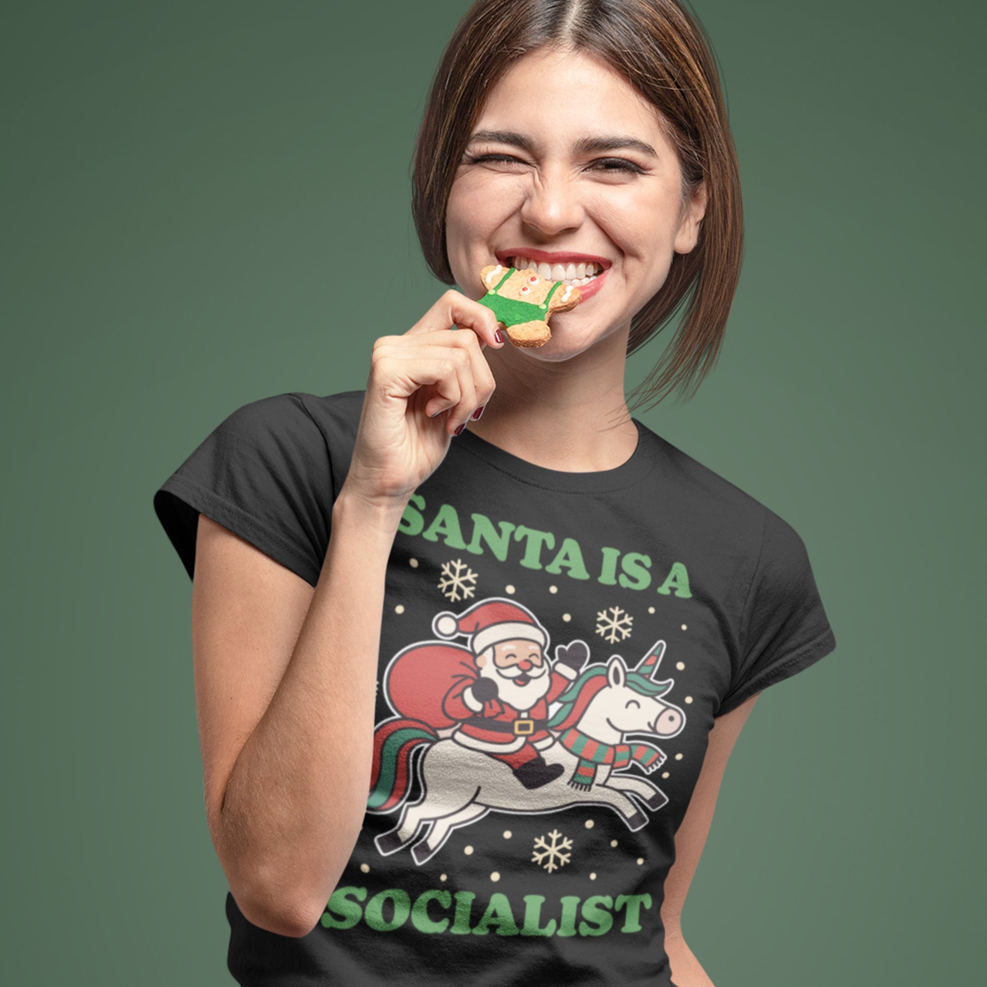 Model wearing a black women’s relaxed t-shirt with a vintage Santa riding a unicorn and stars, printed with “SANTA IS A SOCIALIST,” progressive apparel by Blue Wave USA.