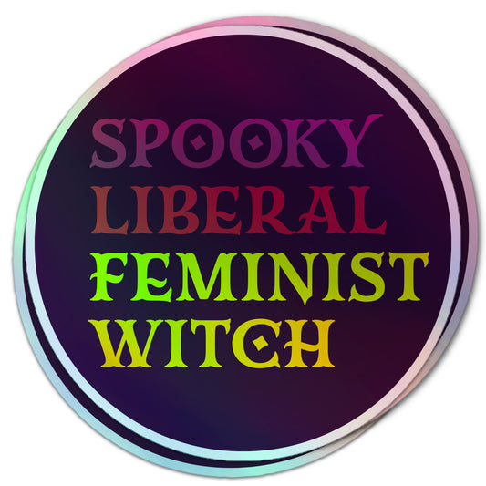 Round holographic sticker in pink and purple, featuring the words “Spooky Liberal Feminist Witch” for feminist and witchy vibes.
