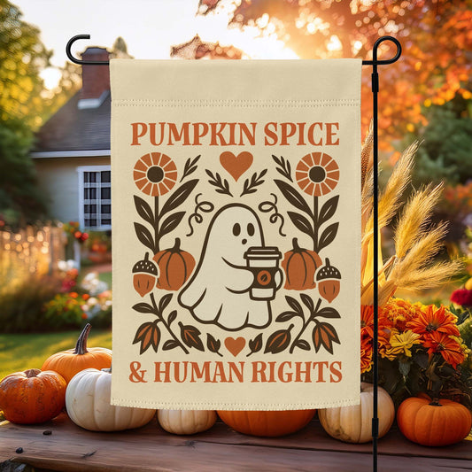 “Pumpkin Spice & Human Rights” Thanksgiving garden flag with folk-art ghost, pumpkins, and flowers, displayed outdoors among fall décor.