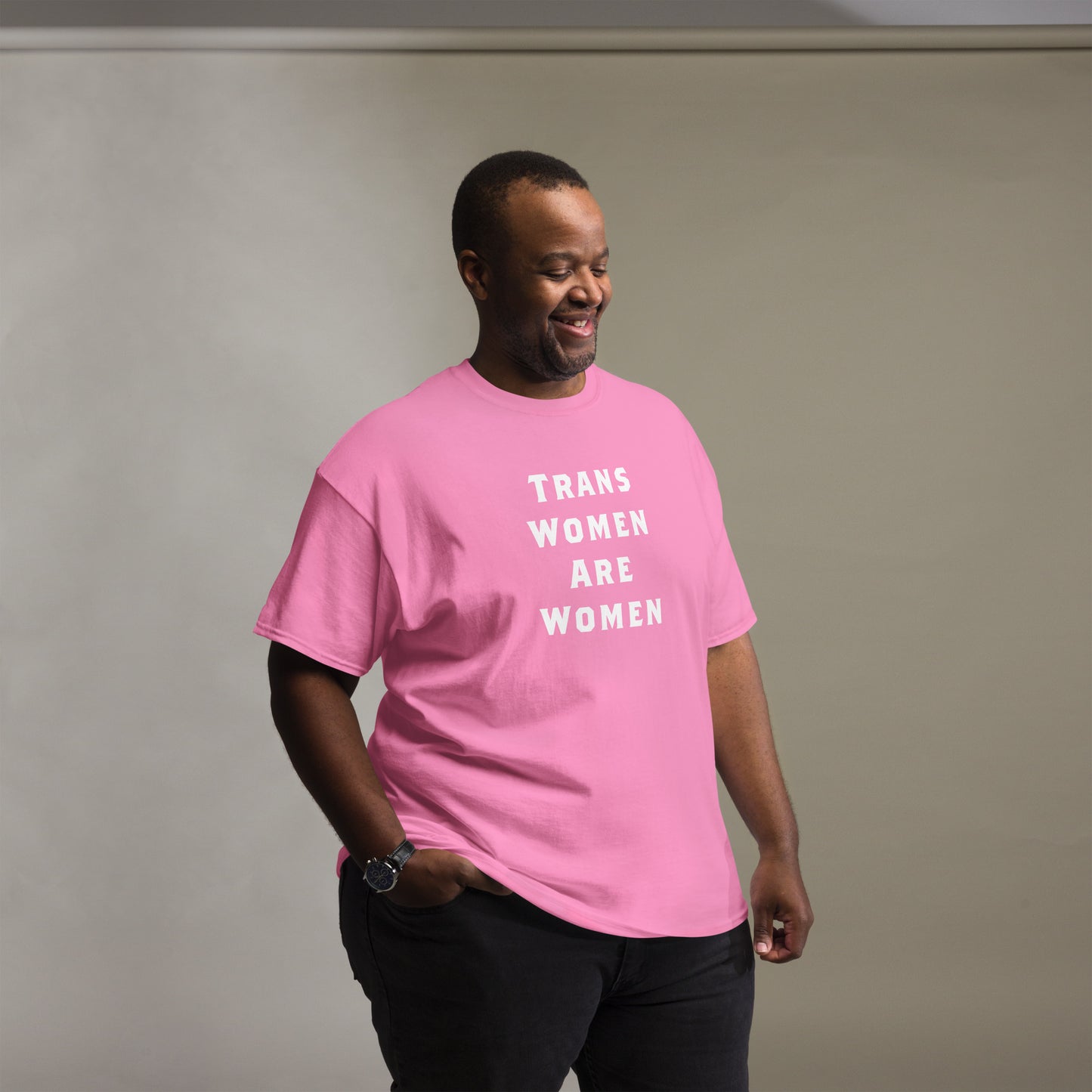 Male activist wearing the Trans Women Are Women | Transgender Rights Unisex Tee