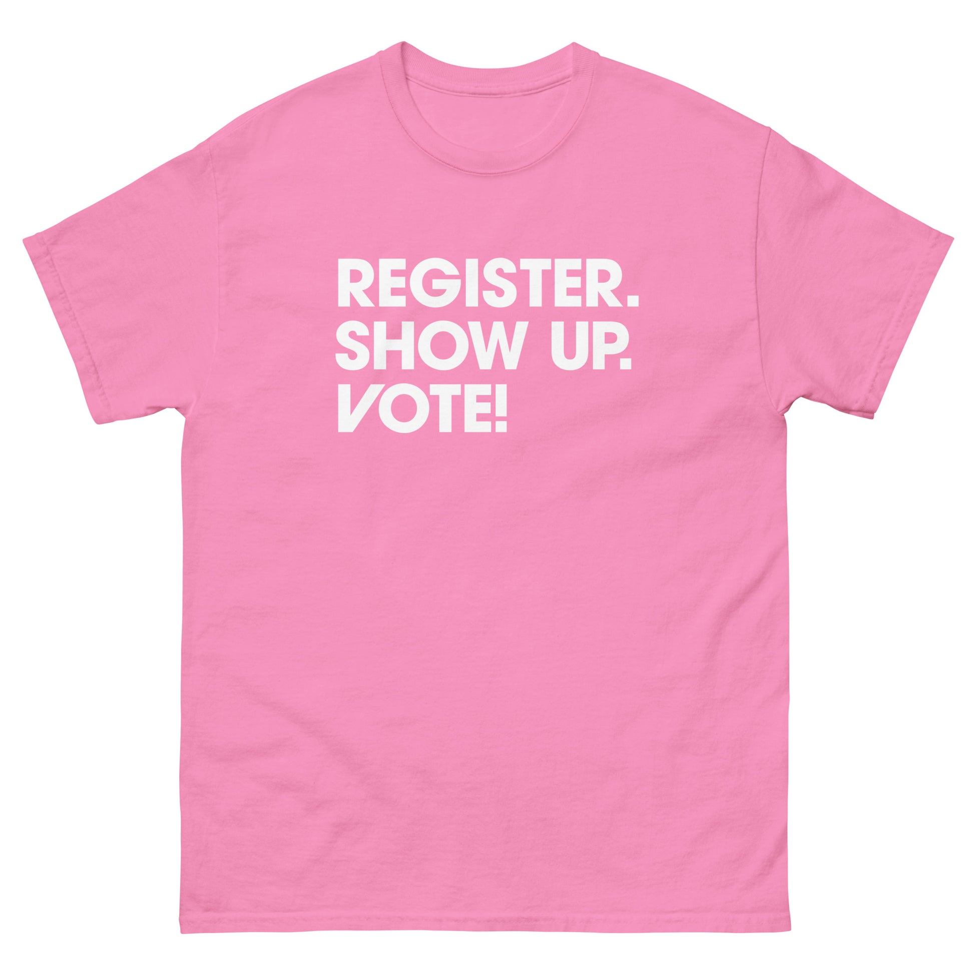 Bright pink unisex classic tee with centered “Register. Show Up. Vote!” civic participation slogan.