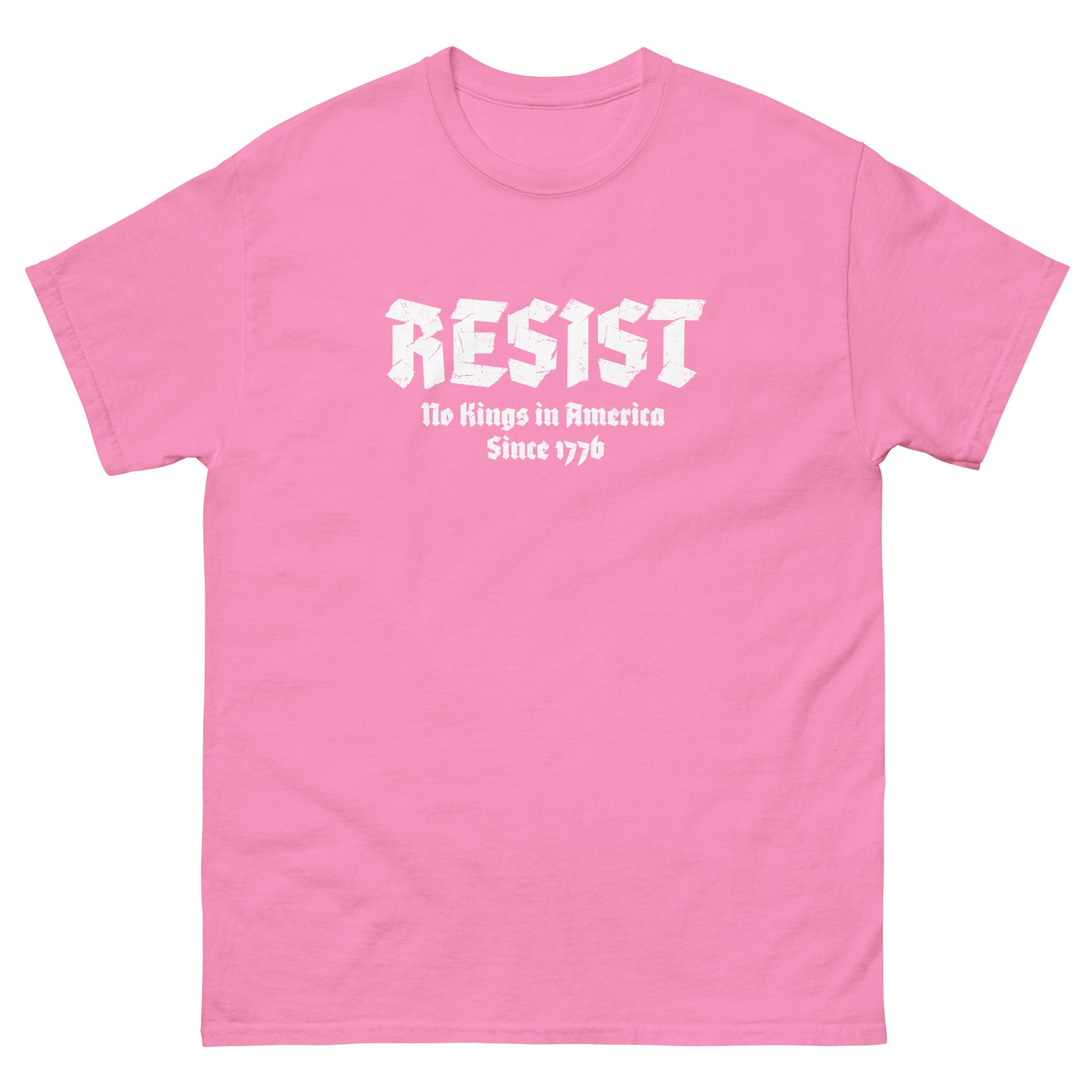 Pink unisex t-shirt displaying gothic-style “RESIST” lettering with phrase “No Kings in America Since 1776.”