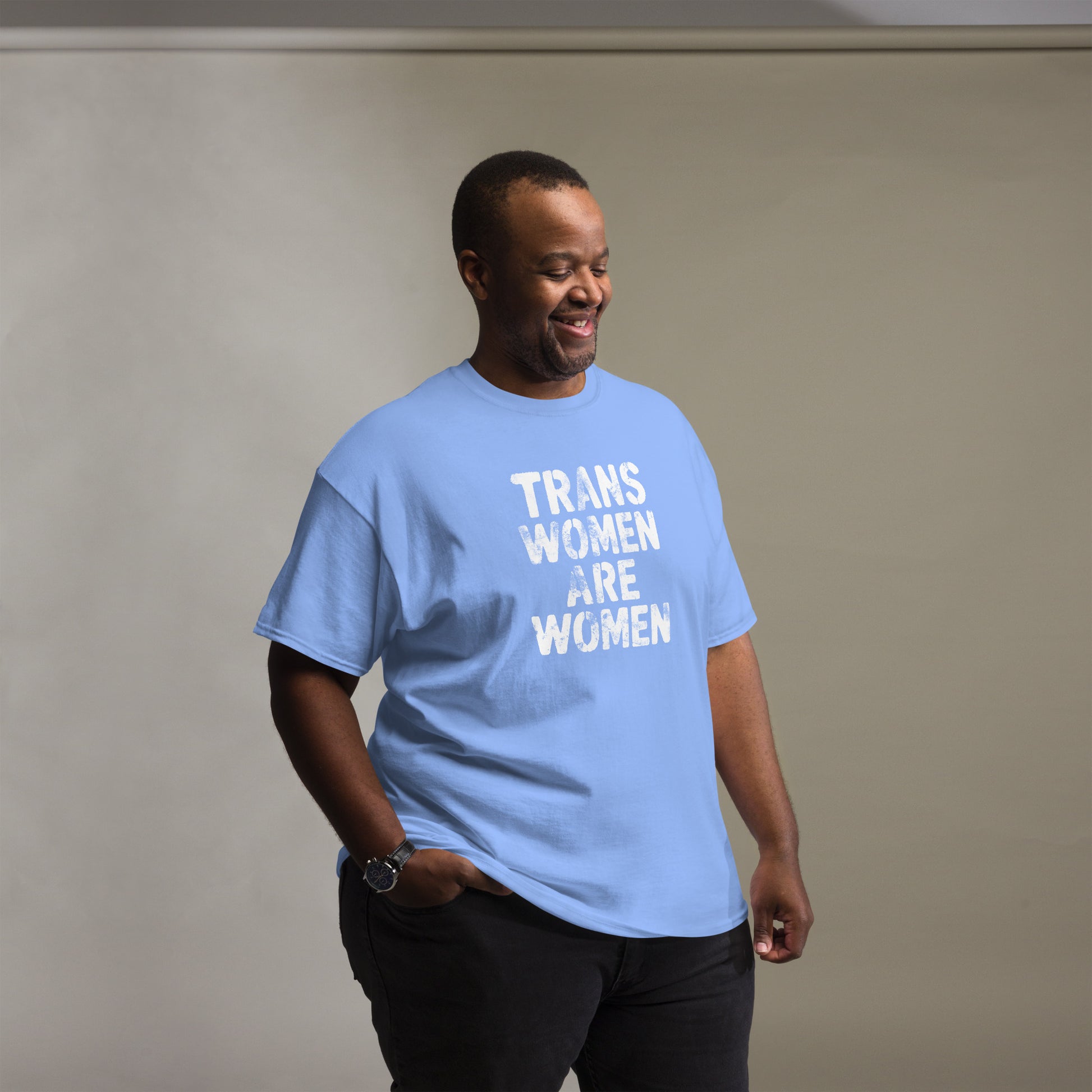 Male trans rights advocate wearing the "Trans Women Are Women" Trans Rights Distressed Tee